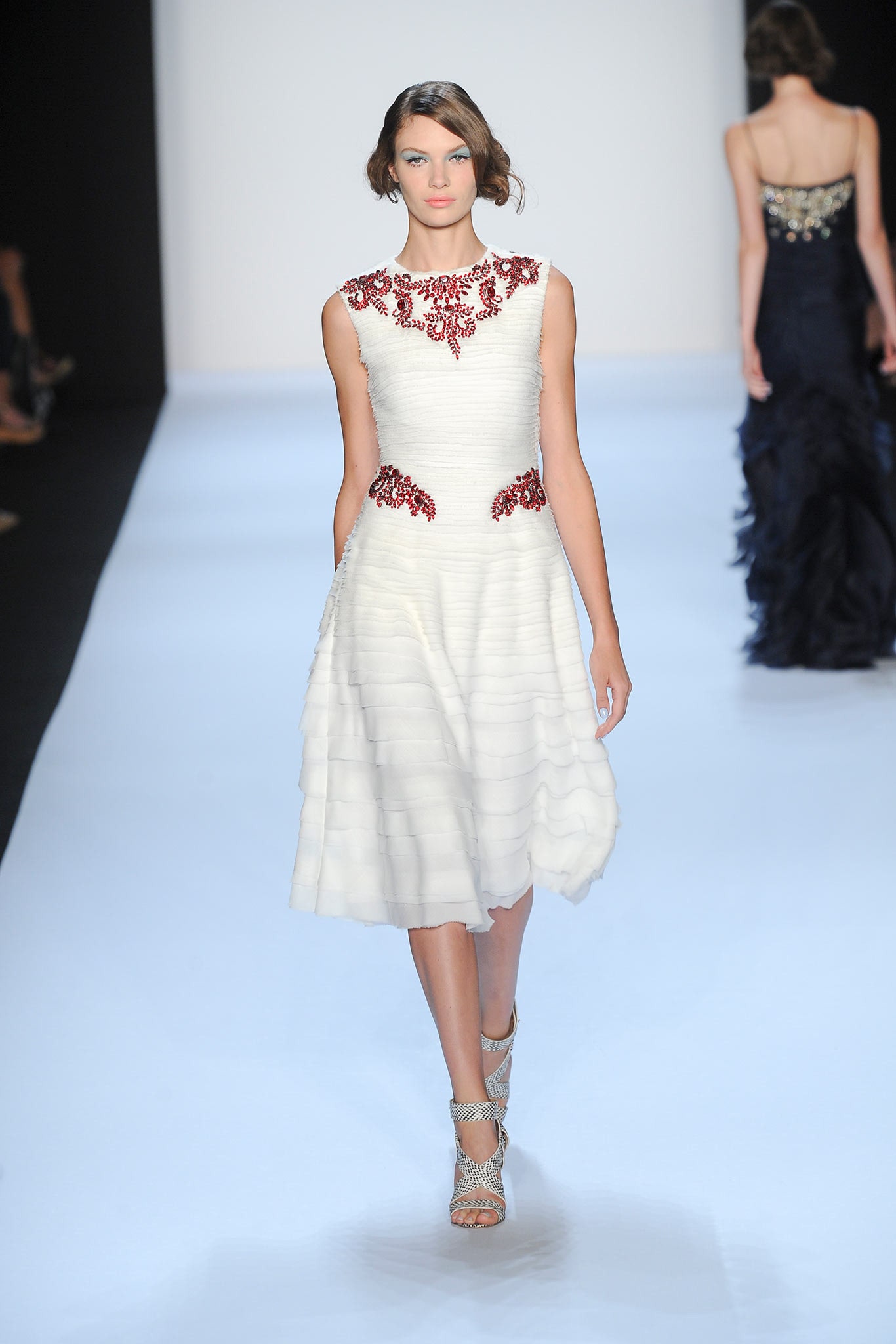 white pleated embroidered dress