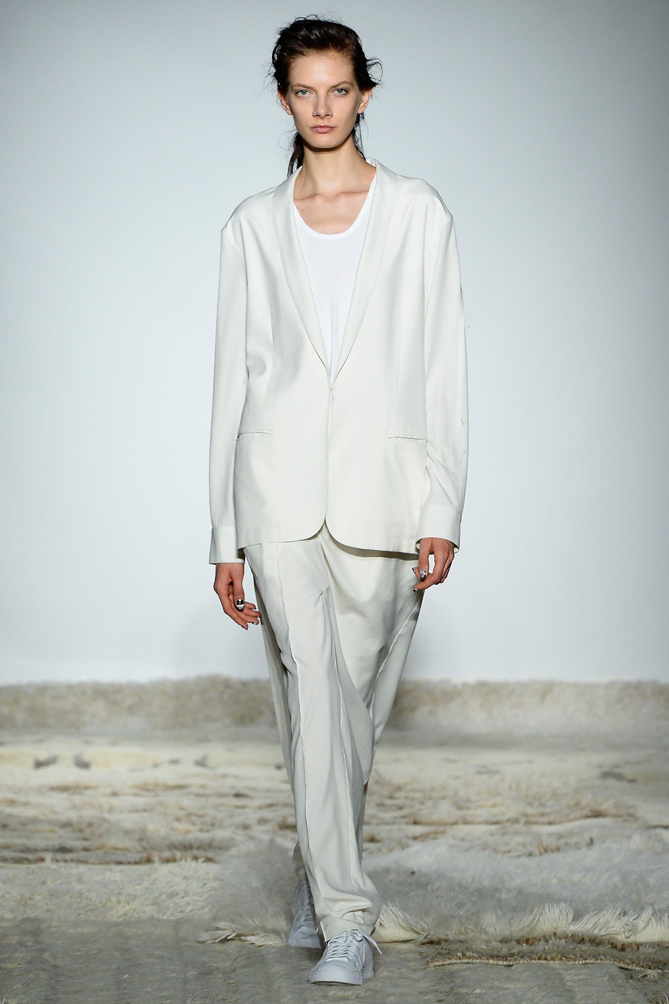white relaxed suit with sleeveless top