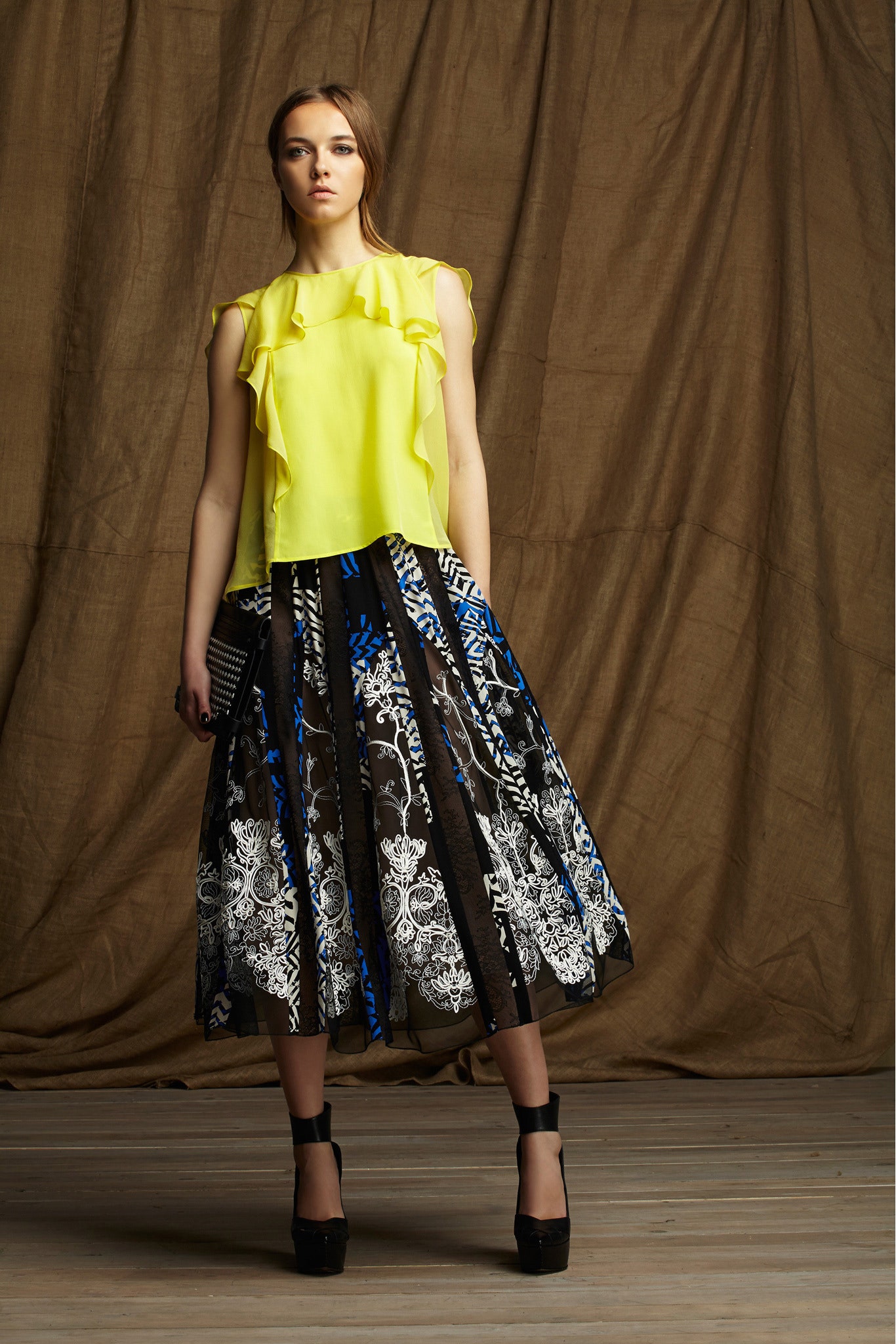 yellow ruffled top and midi skirt