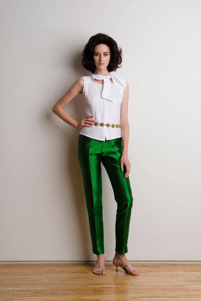 white top green tailored pants