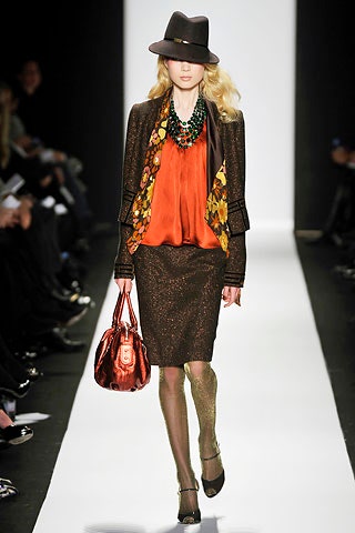 brown tweed blazer with orange blouse