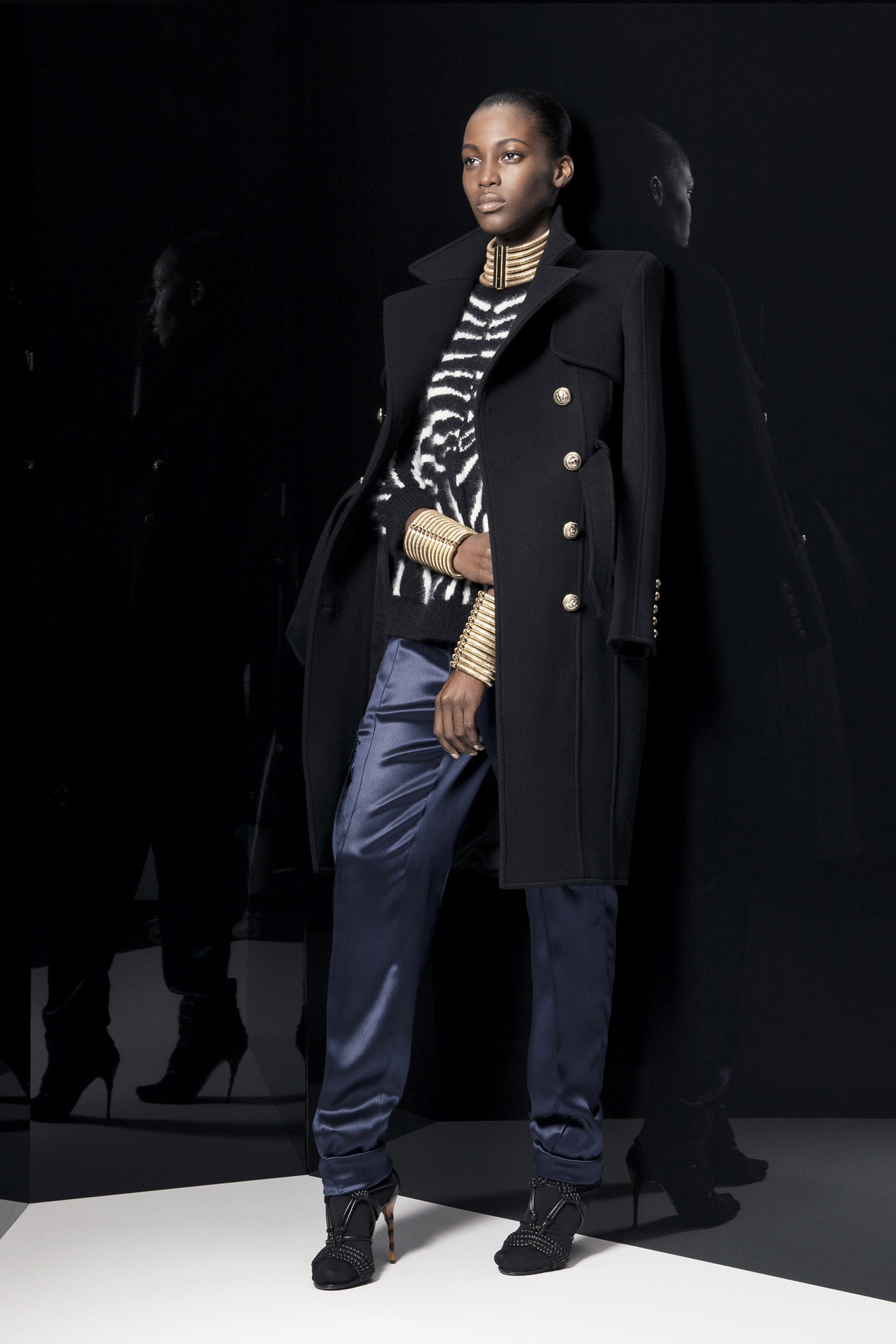 black wool coat with printed top