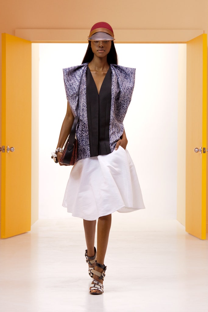 blue layered top with white skirt