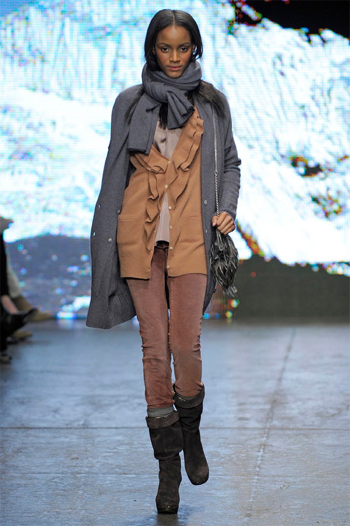 gray wool coat with ruffled blouse