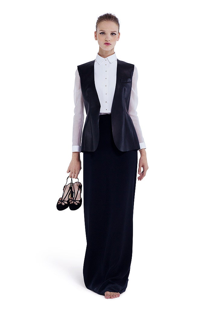 black leather vest white shirt black skirt