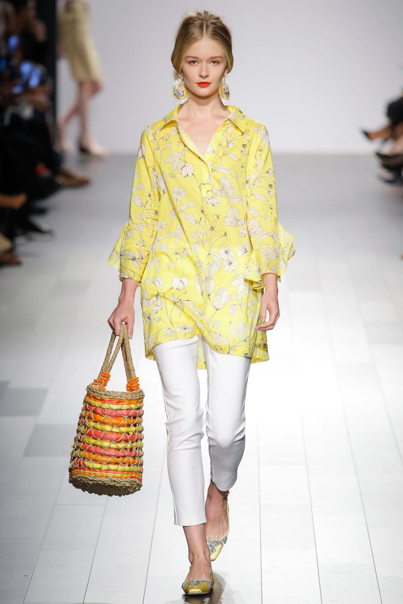 yellow floral shirt with white pants