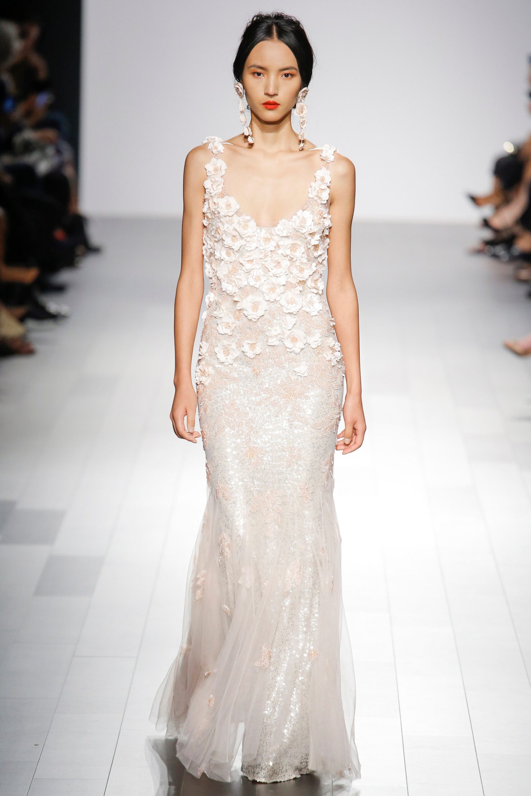 white sequined sleeveless gown