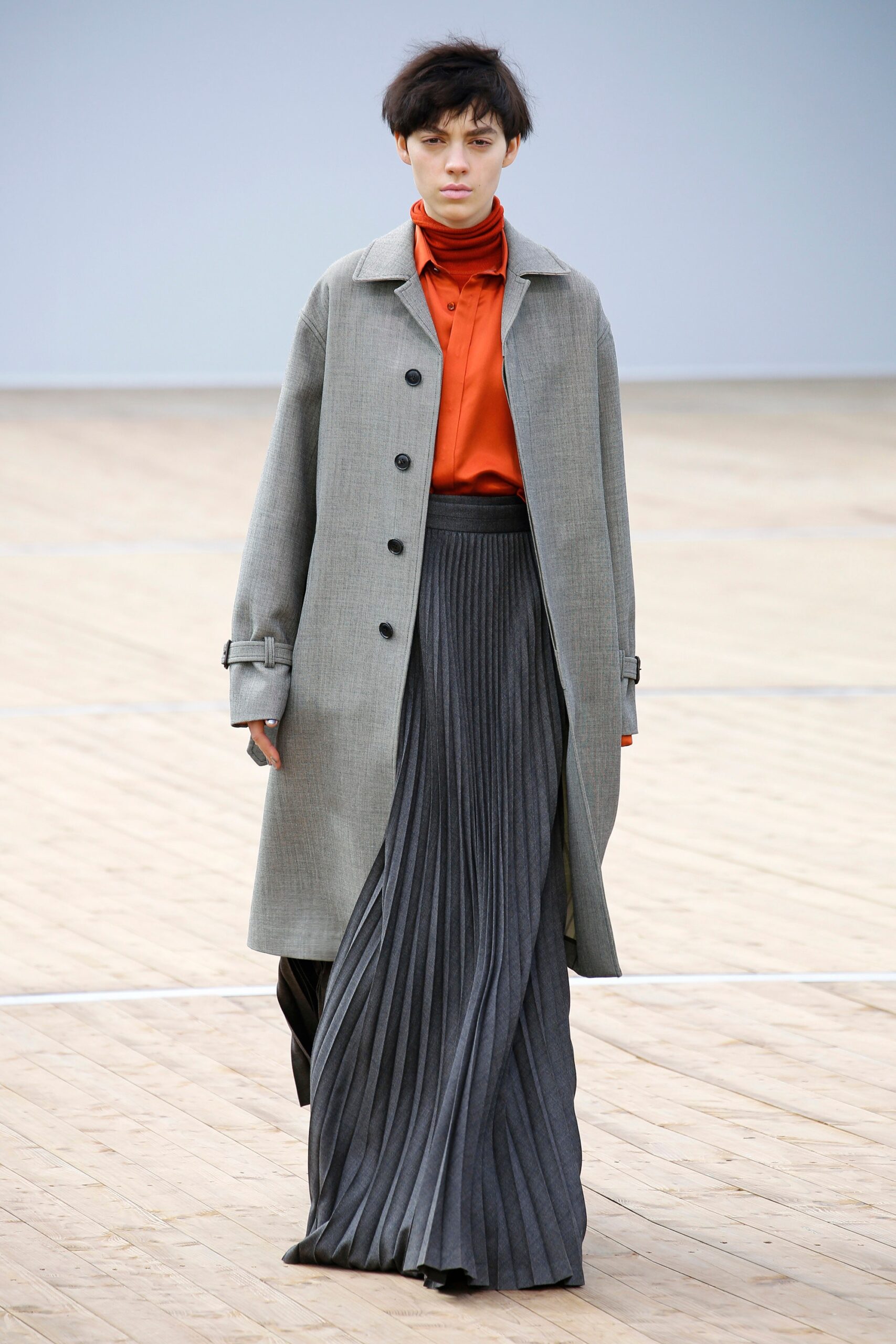 orange unknown collared buttoned shirt