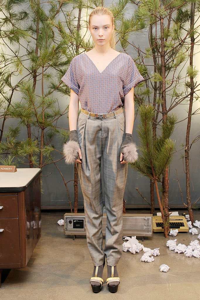 blue printed top with gray tailored pants