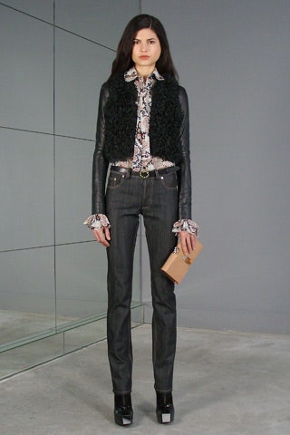 black fur jacket with ruffled shirt