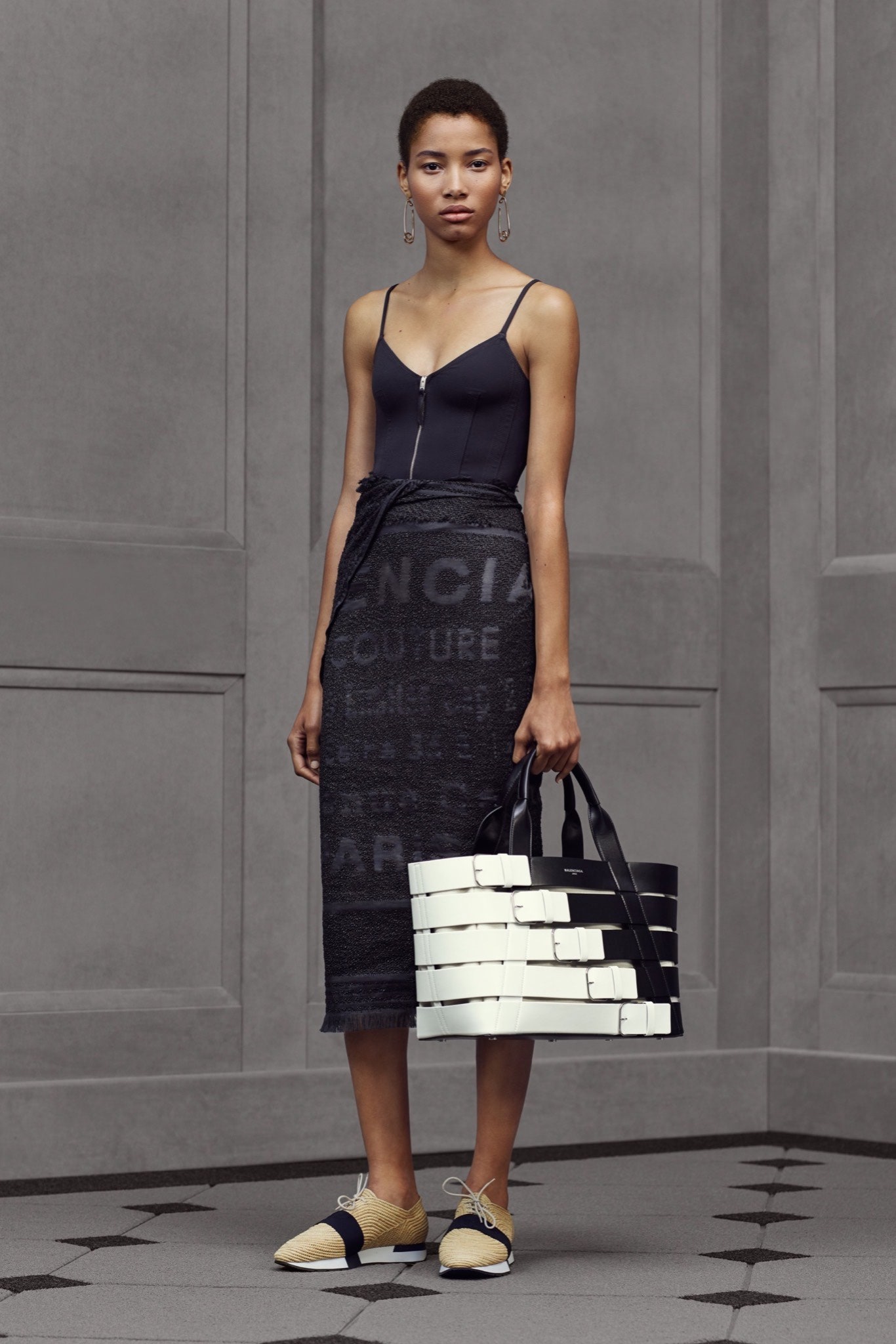 black fitted top and midi skirt