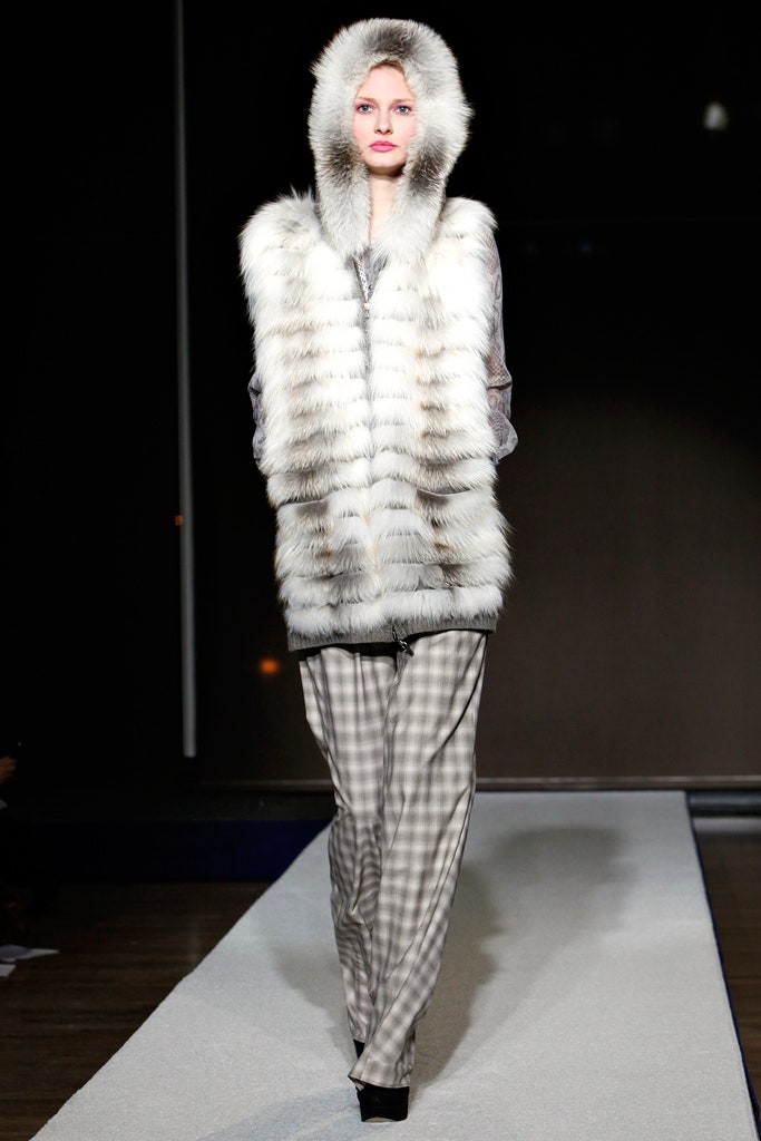 white fur hooded vest