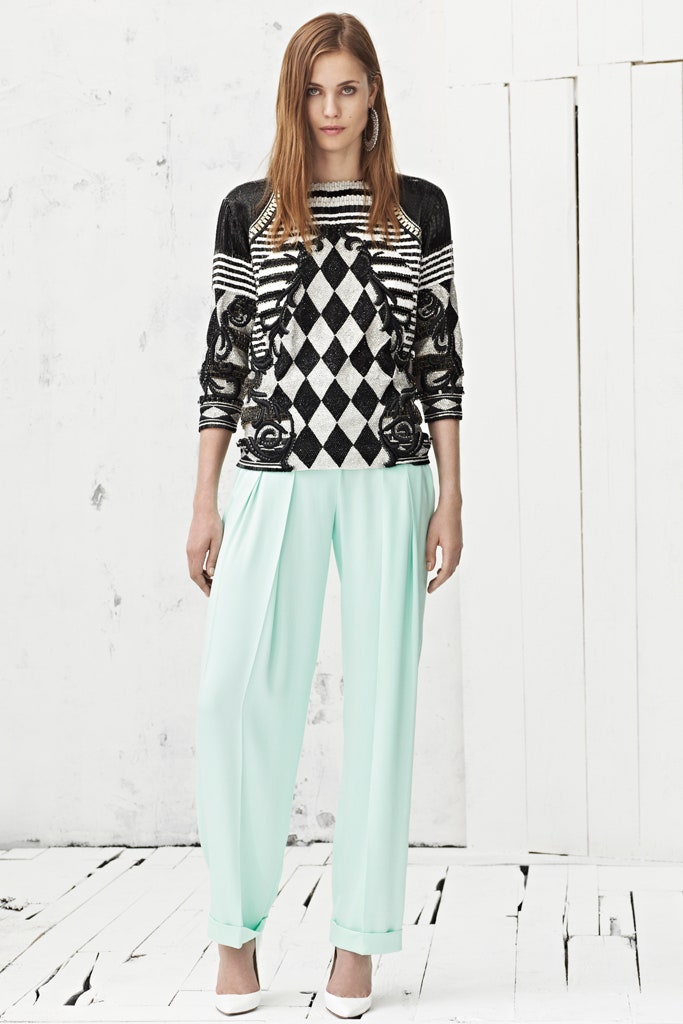 black and white printed top with mint pants