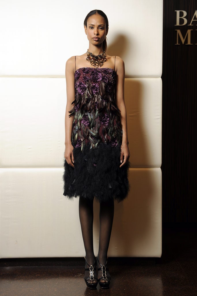 black and purple feathered dress