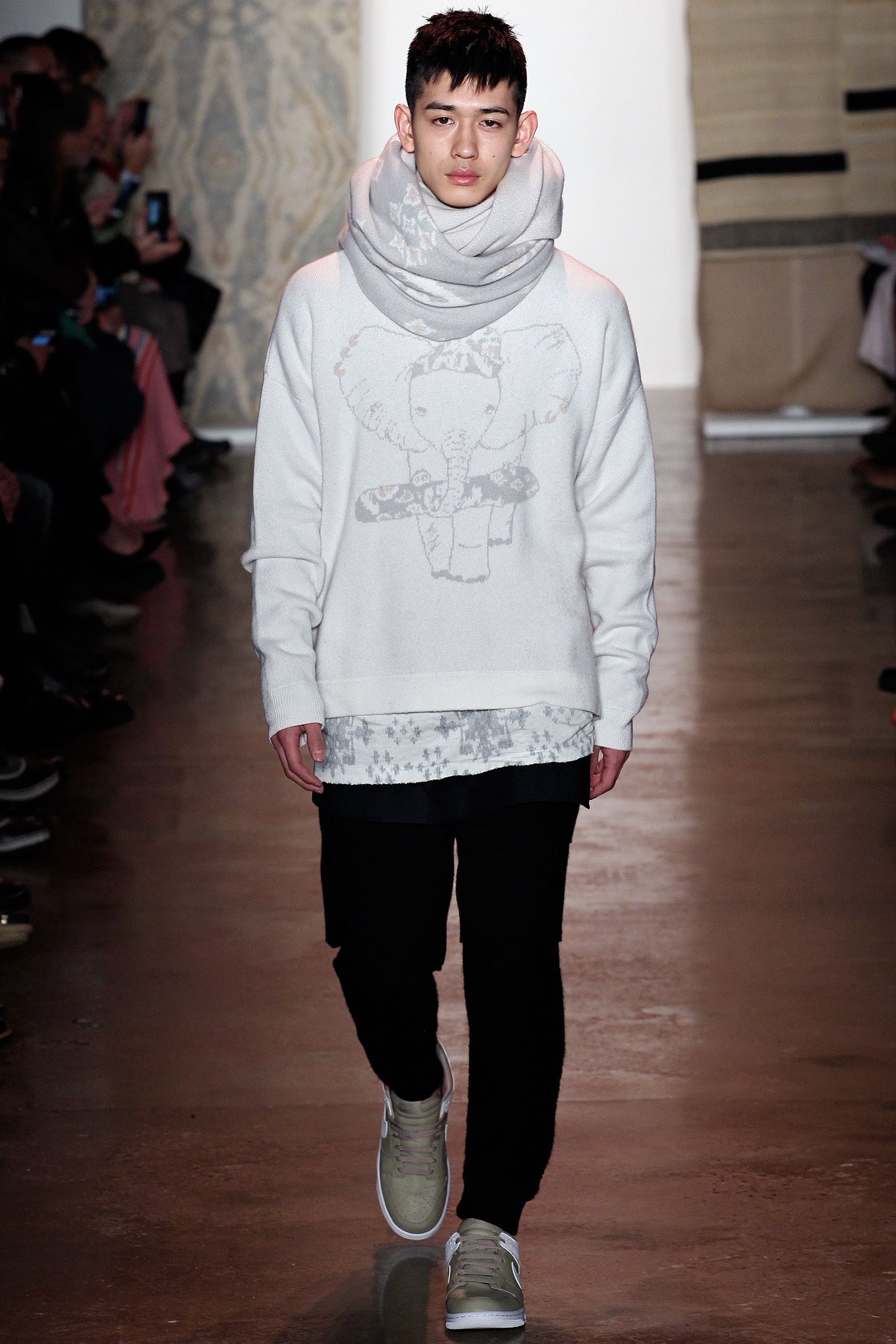 white printed sweater with black pants