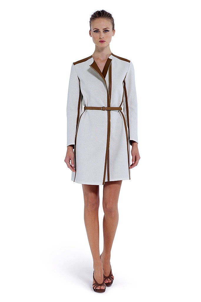 white fitted coat with brown details