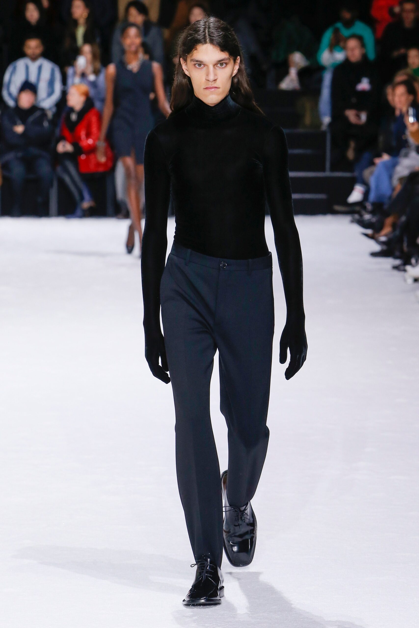black fitted top and tailored pants