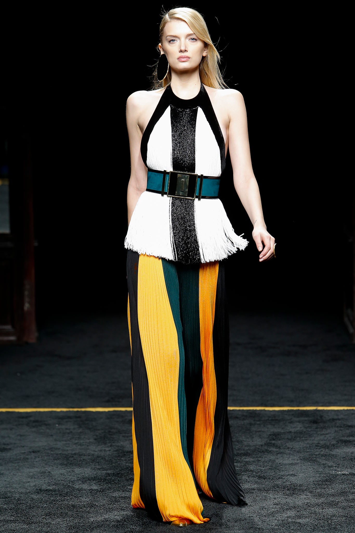 black and white fringed top with pleated pants