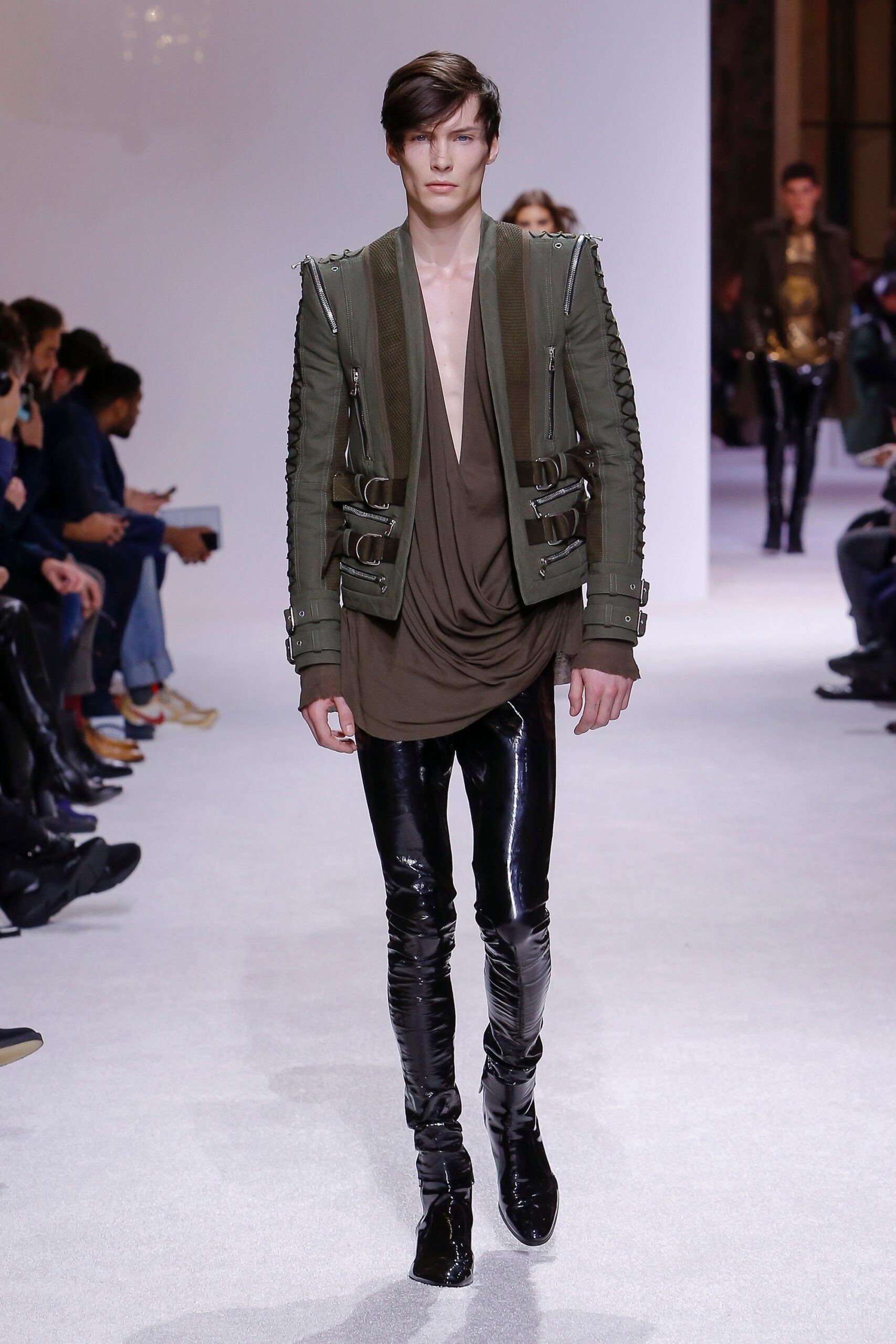 green fitted jacket with brown top