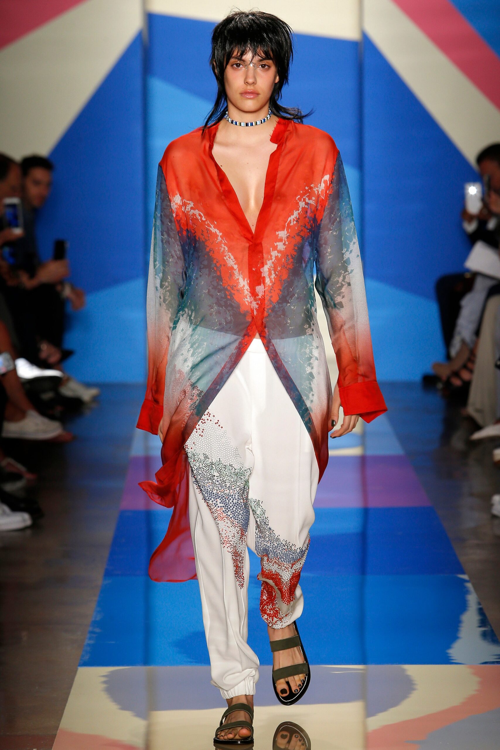 sheer red and blue shirt with relaxed pants