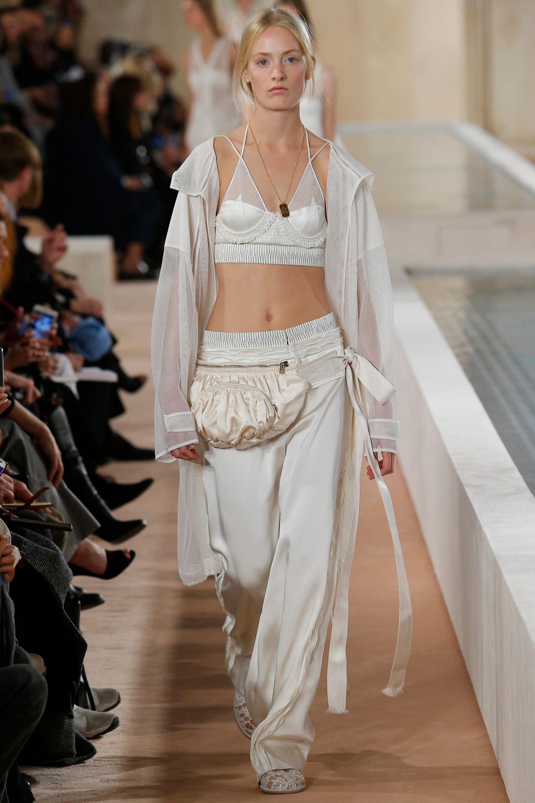 white fitted top with relaxed pants