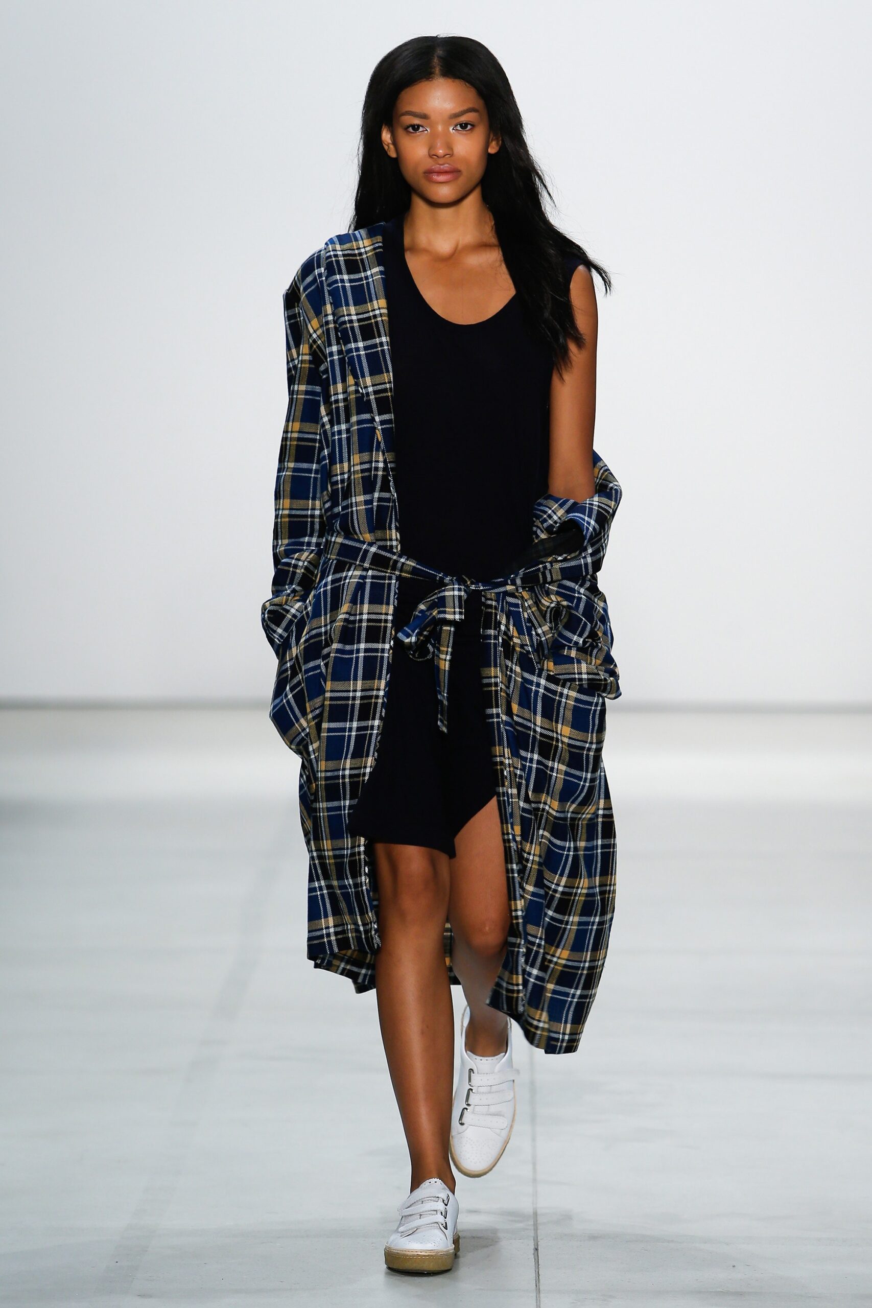 black mini dress with checked coat