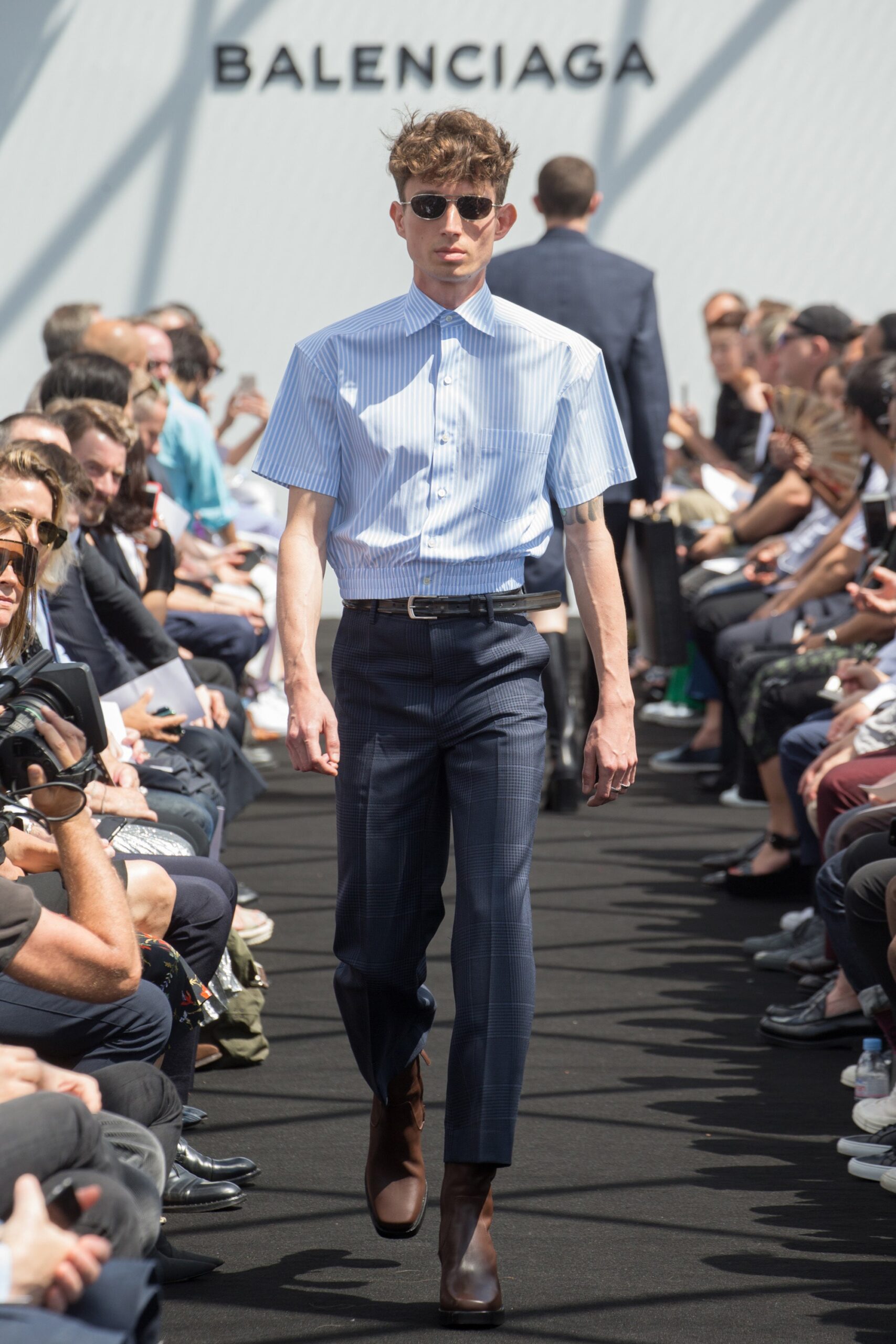 blue striped shirt and navy pants