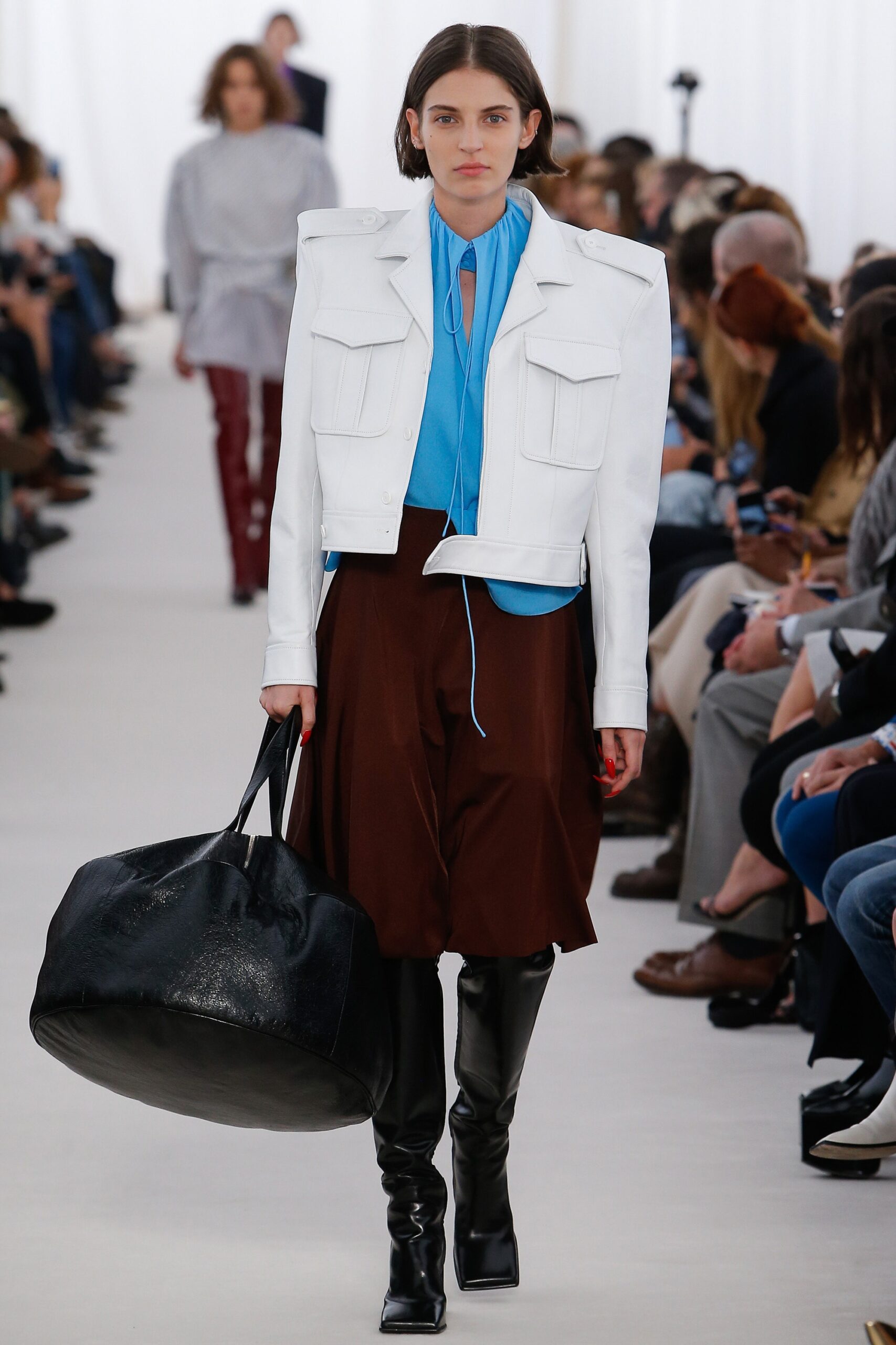 white structured jacket with blue shirt