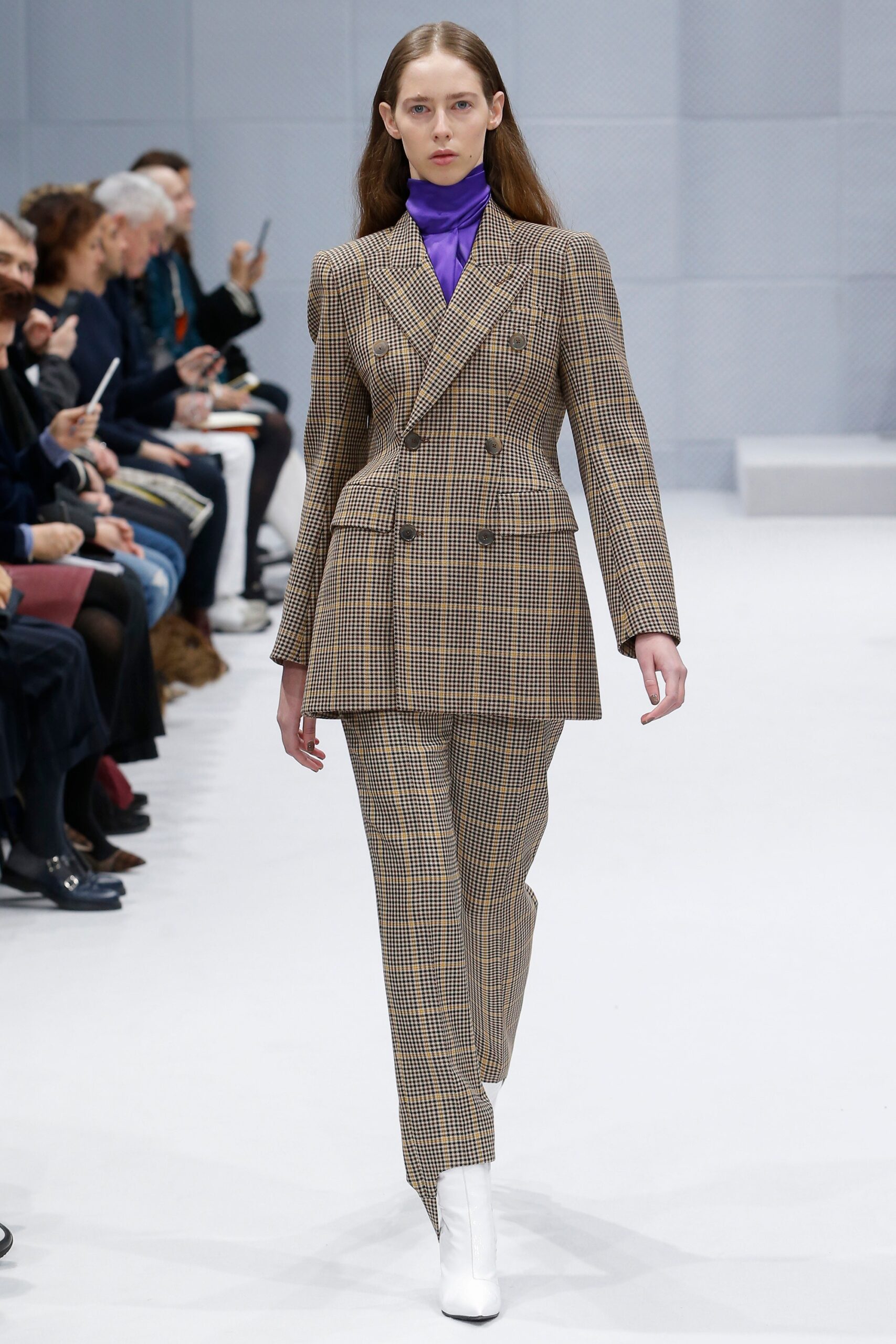 brown checked tailored suit with purple top