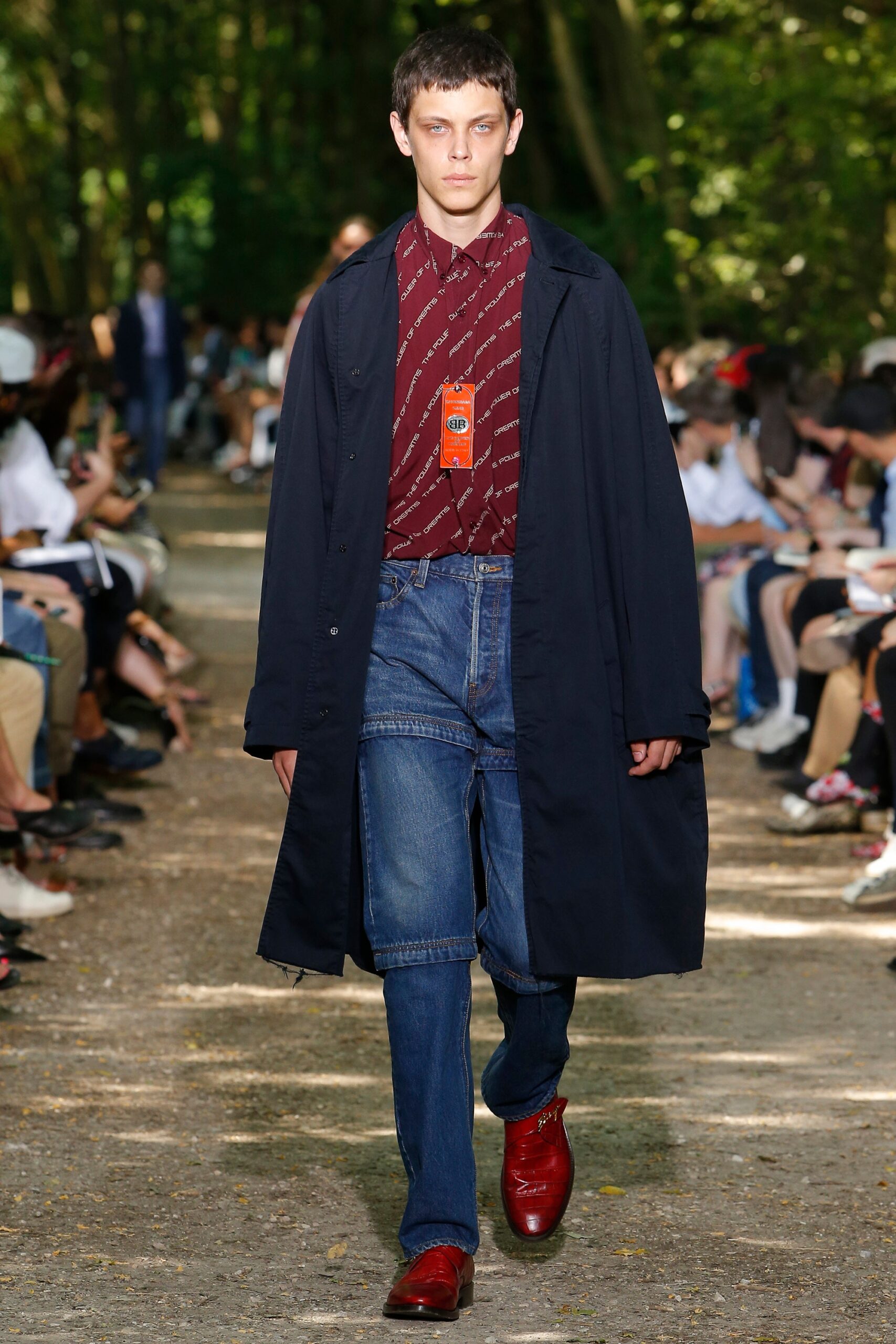 black coat red shirt blue pants