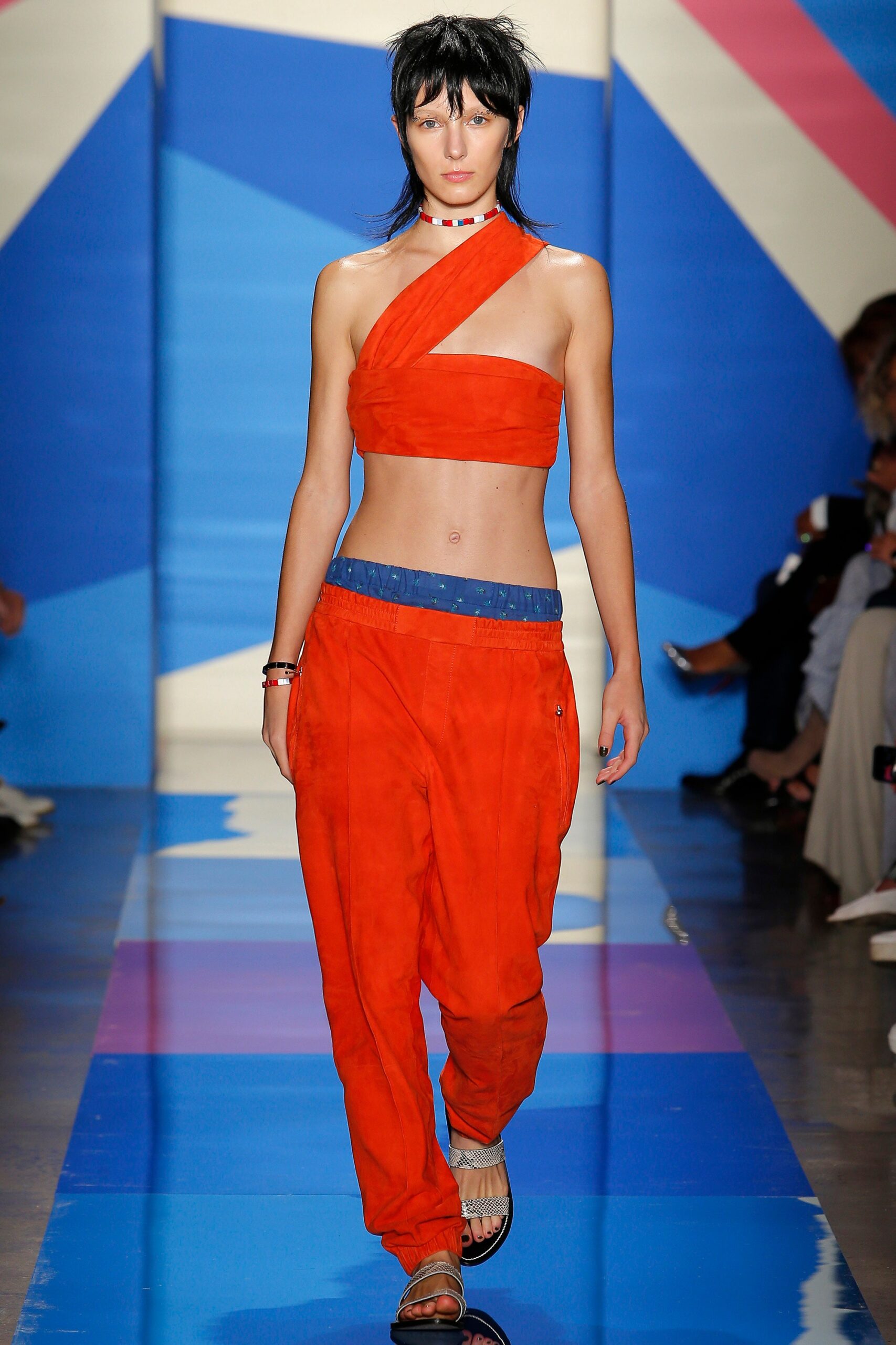 red crop-top and relaxed pants