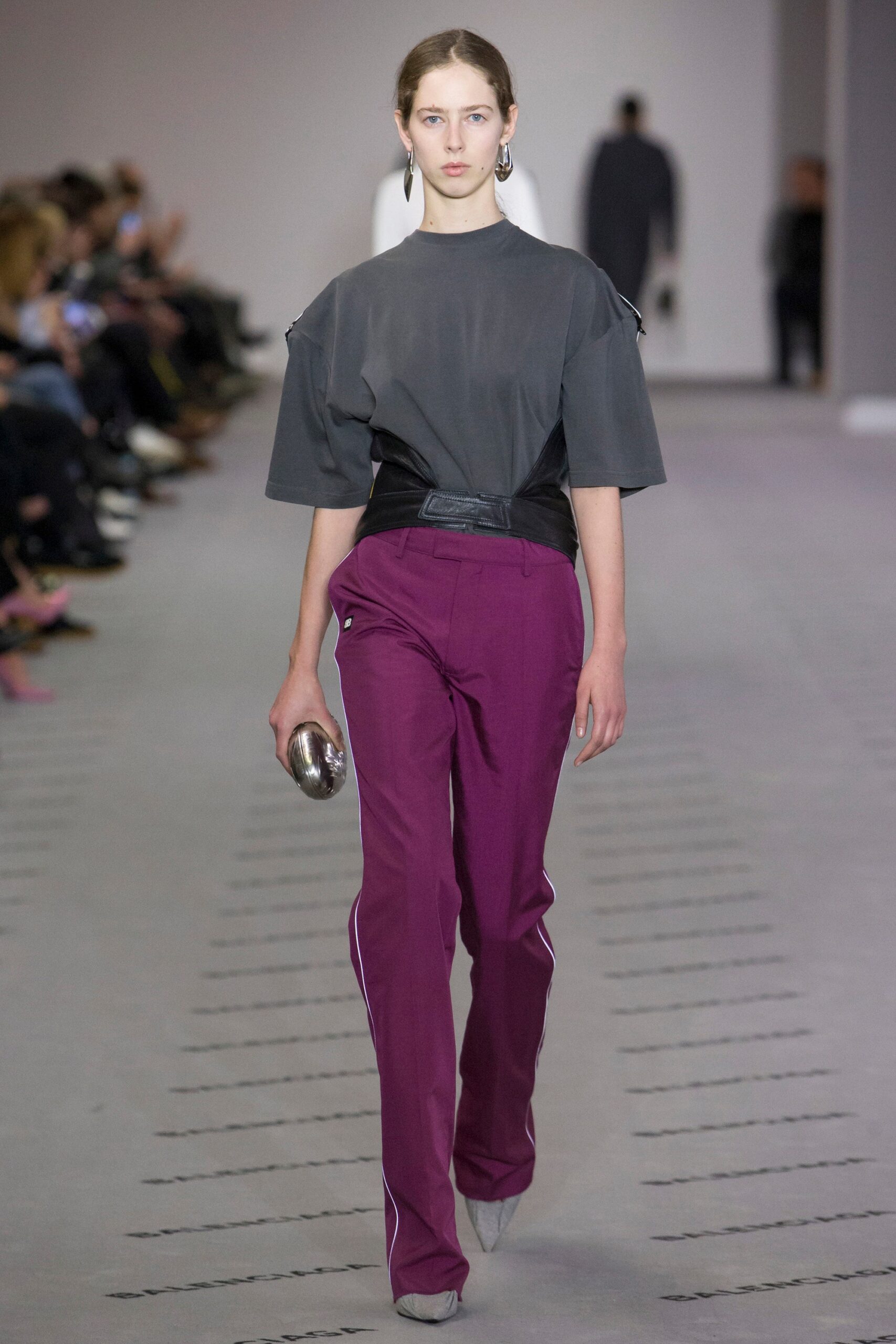 gray relaxed top with purple pants