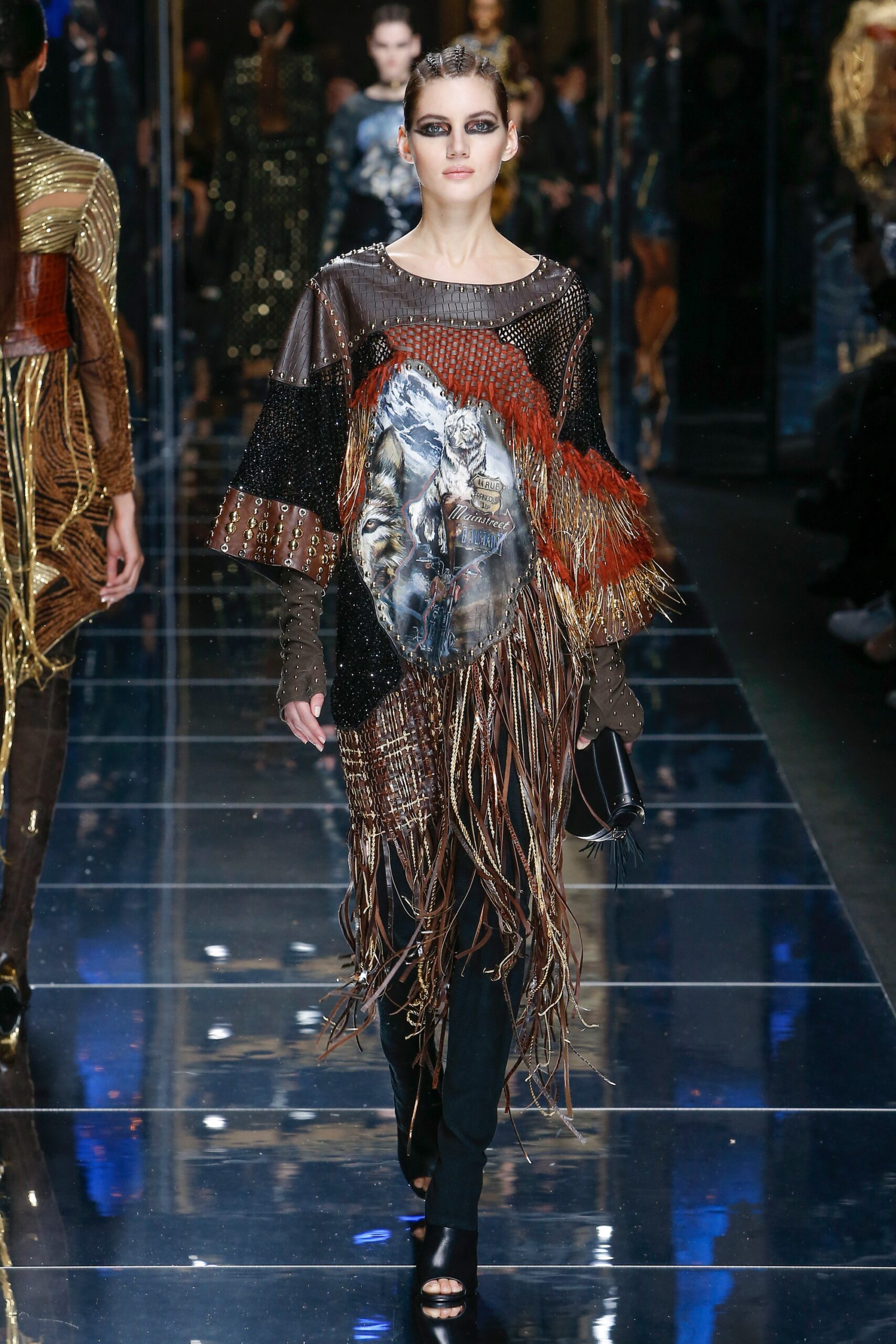 relaxed black and brown top with fringes