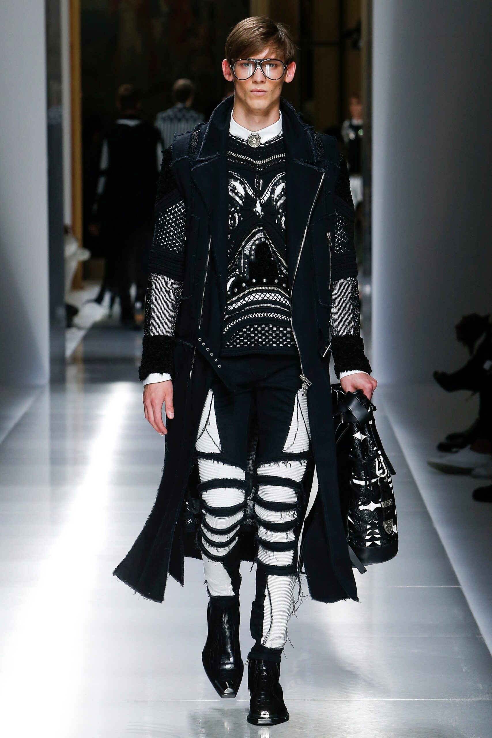 black wool coat with embellished sweater