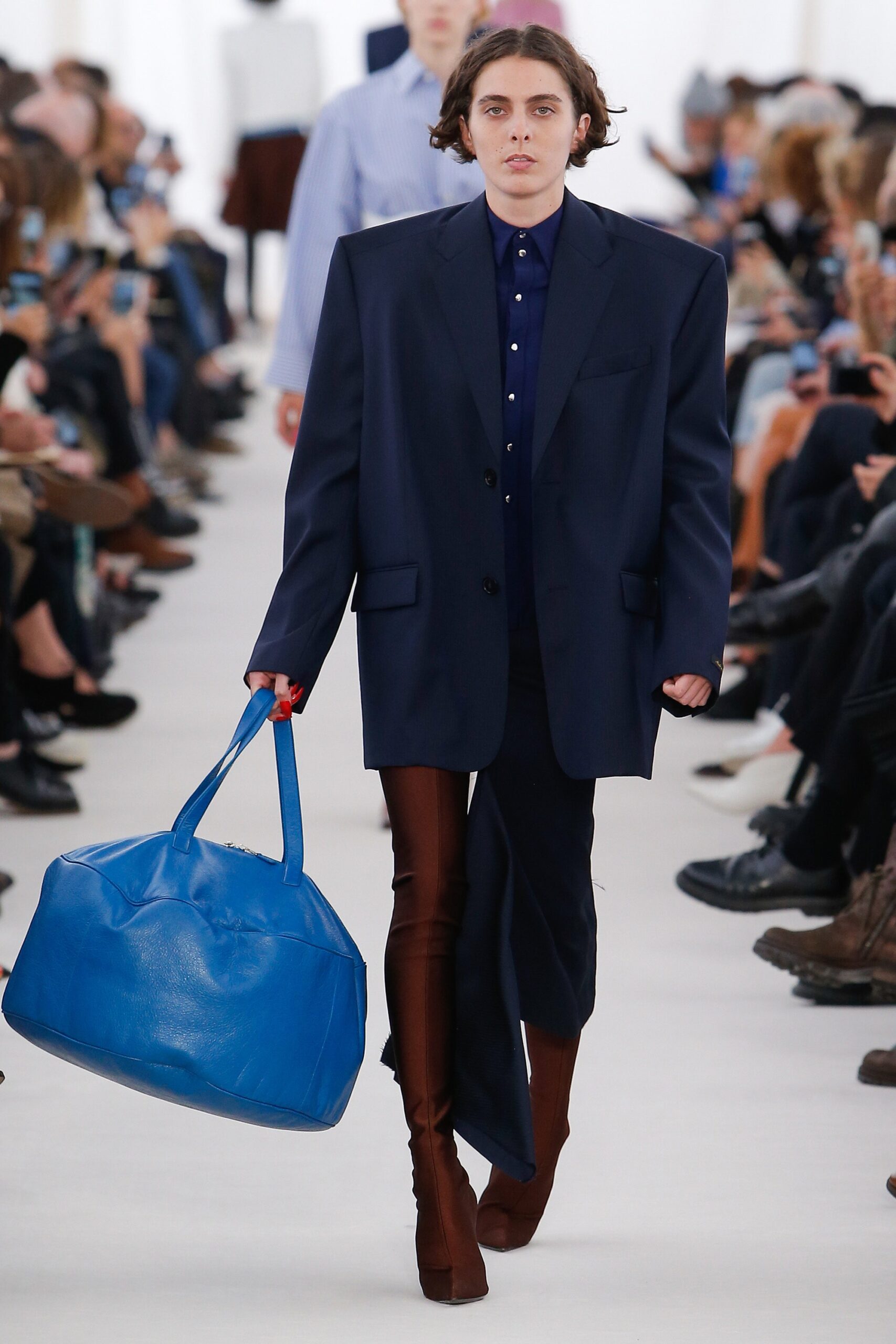 oversized navy blazer with brown pants