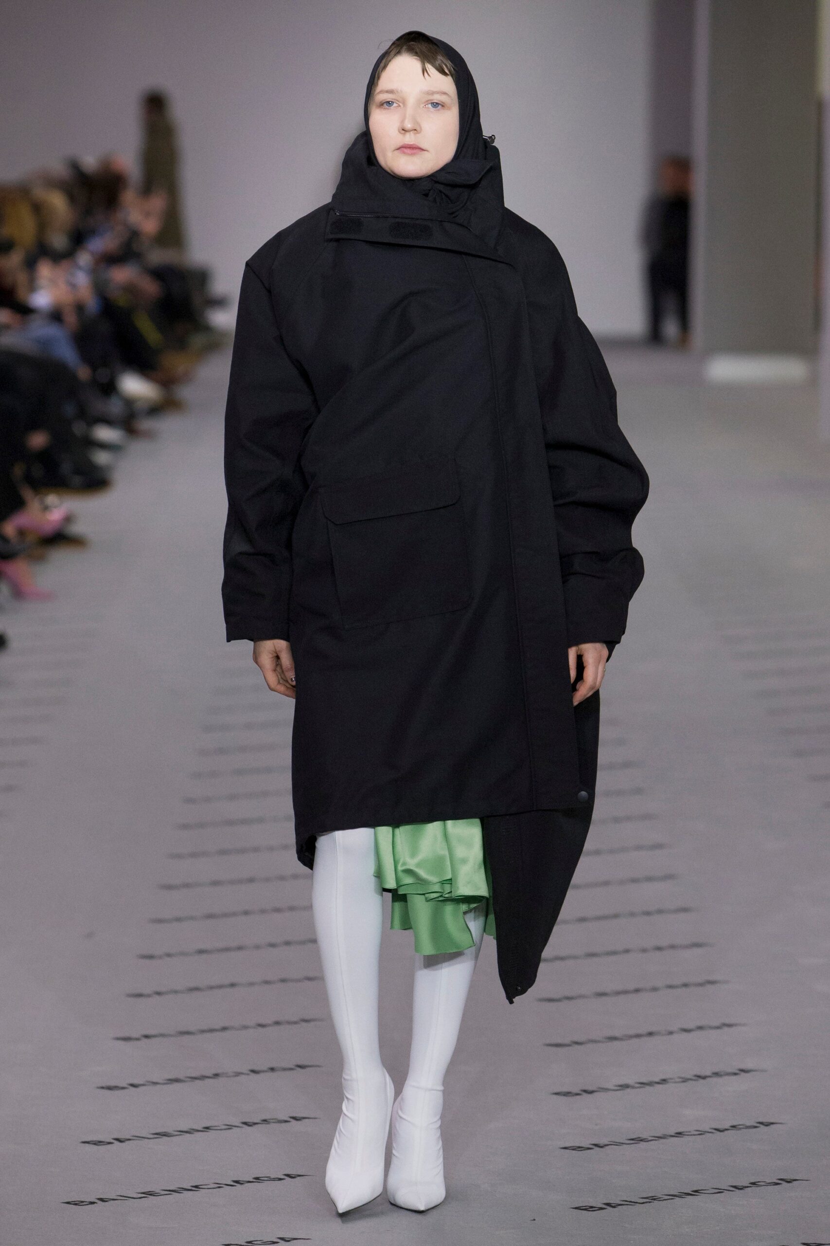 oversized black coat with green skirt