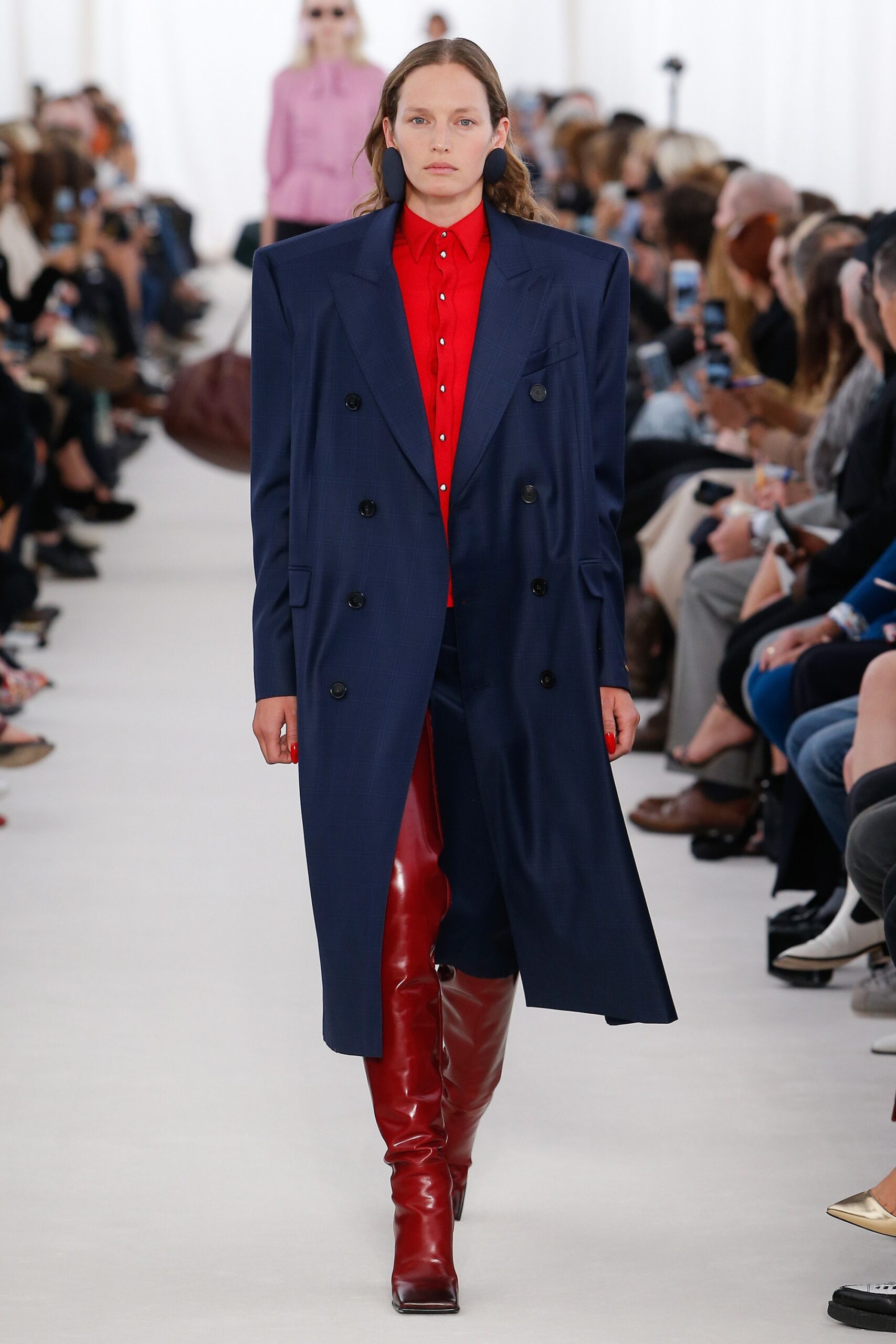 navy coat red shirt red boots