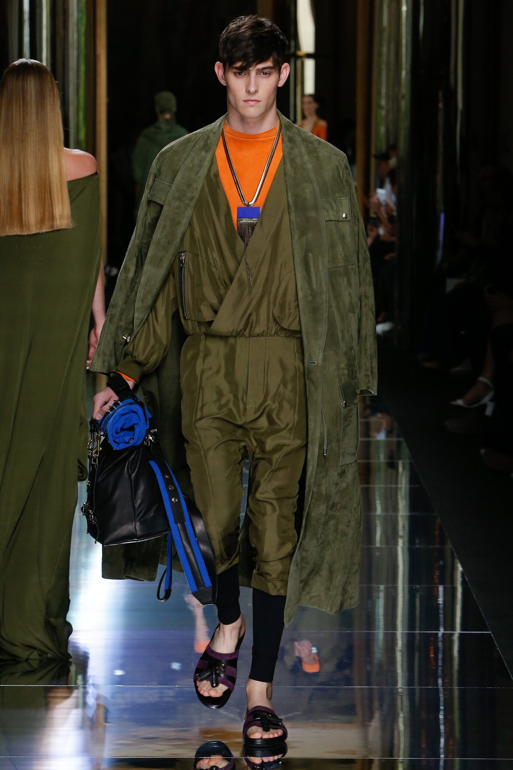 green suede coat and jumpsuit