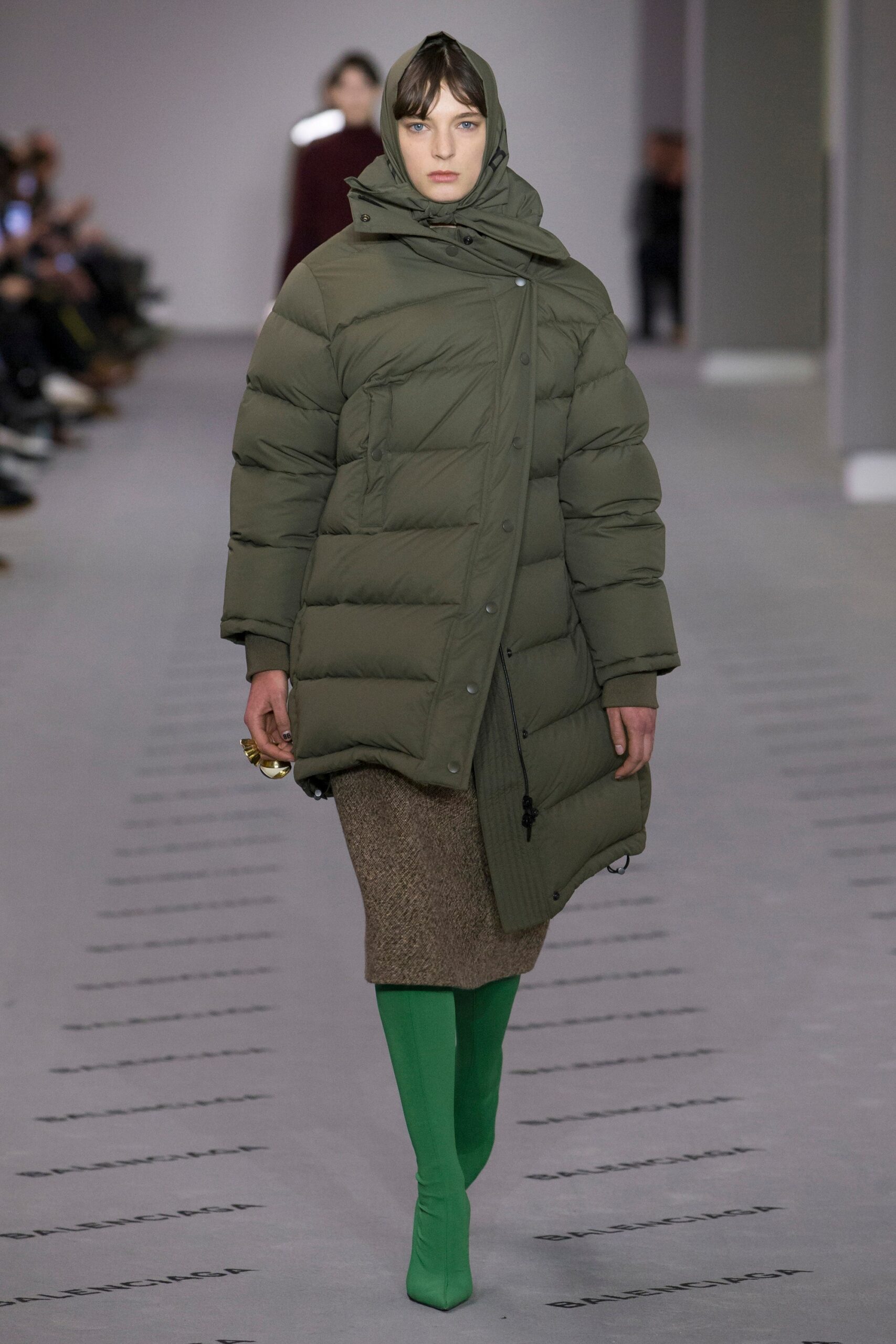 green coat with brown skirt