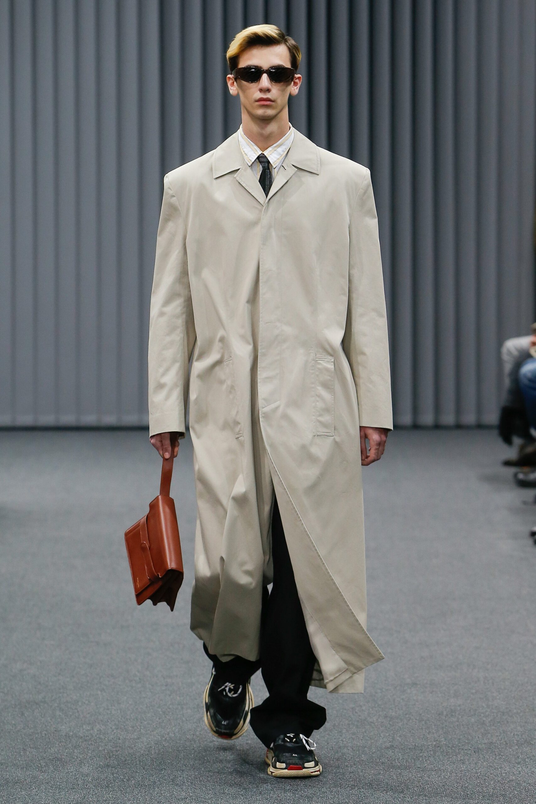 beige coat with black pants