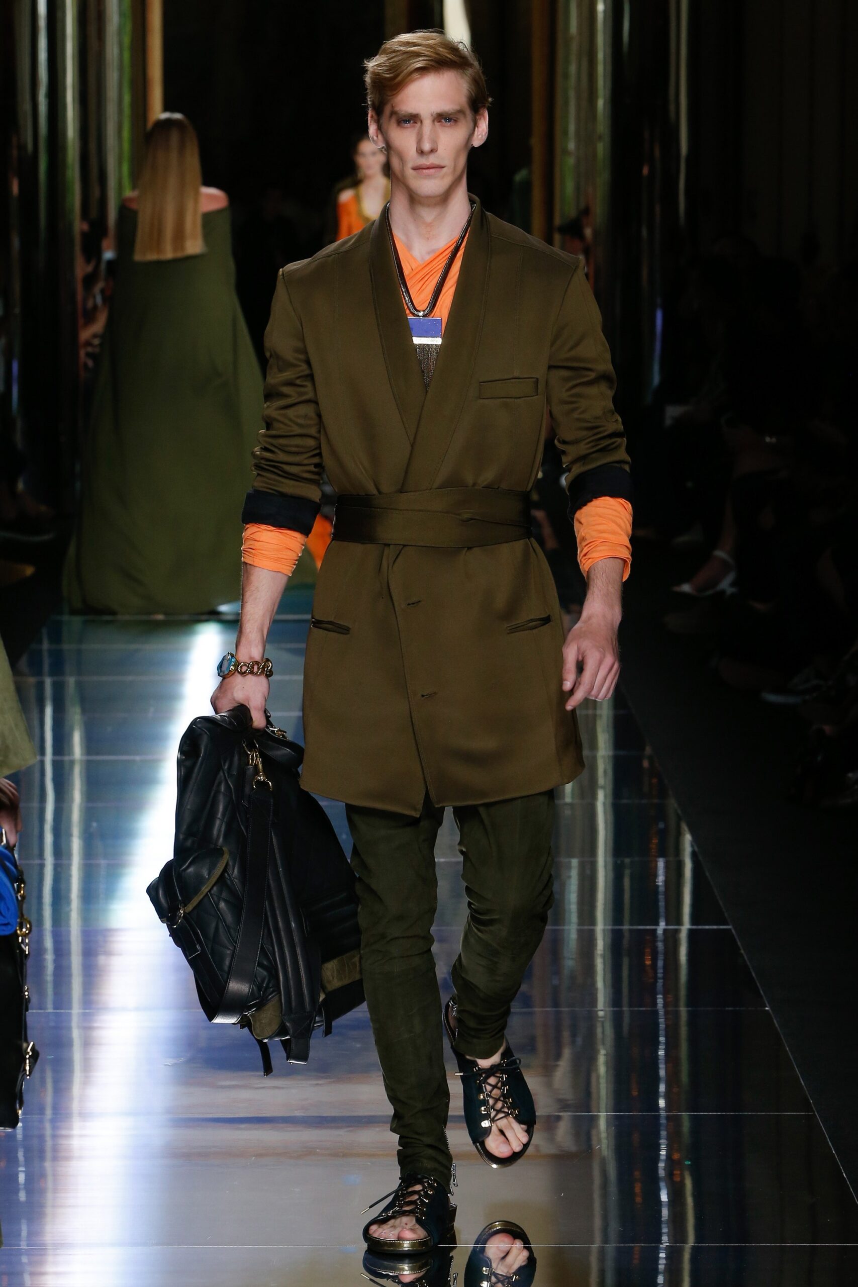 green tailored blazer with orange shirt