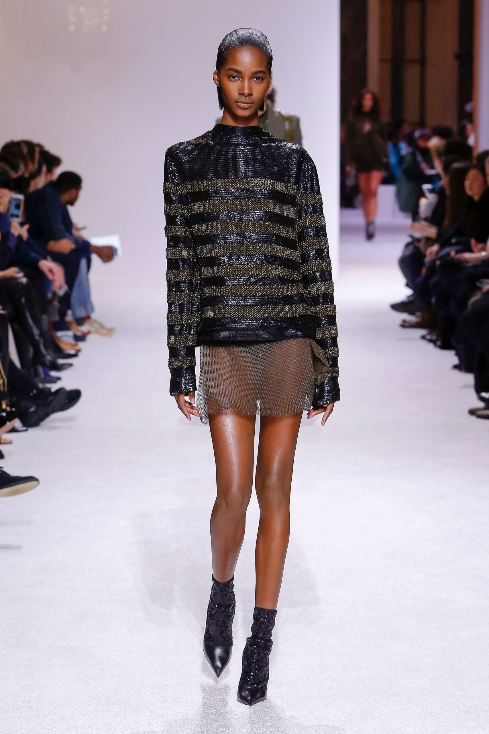 black knit striped top with mini skirt