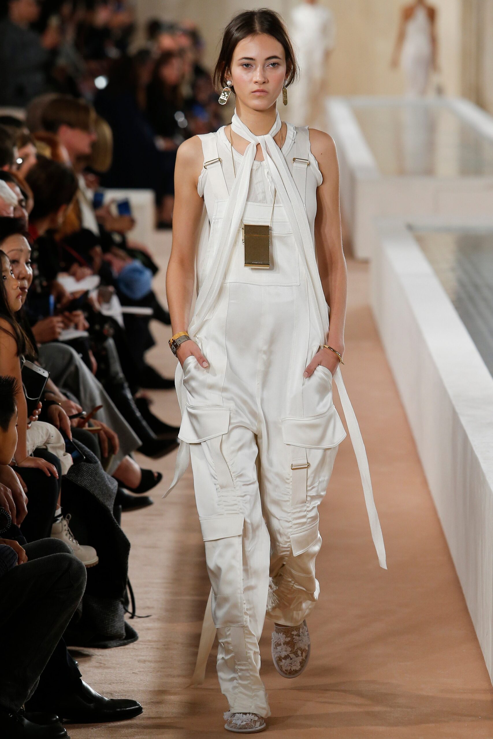 white fitted sleeveless jumpsuit