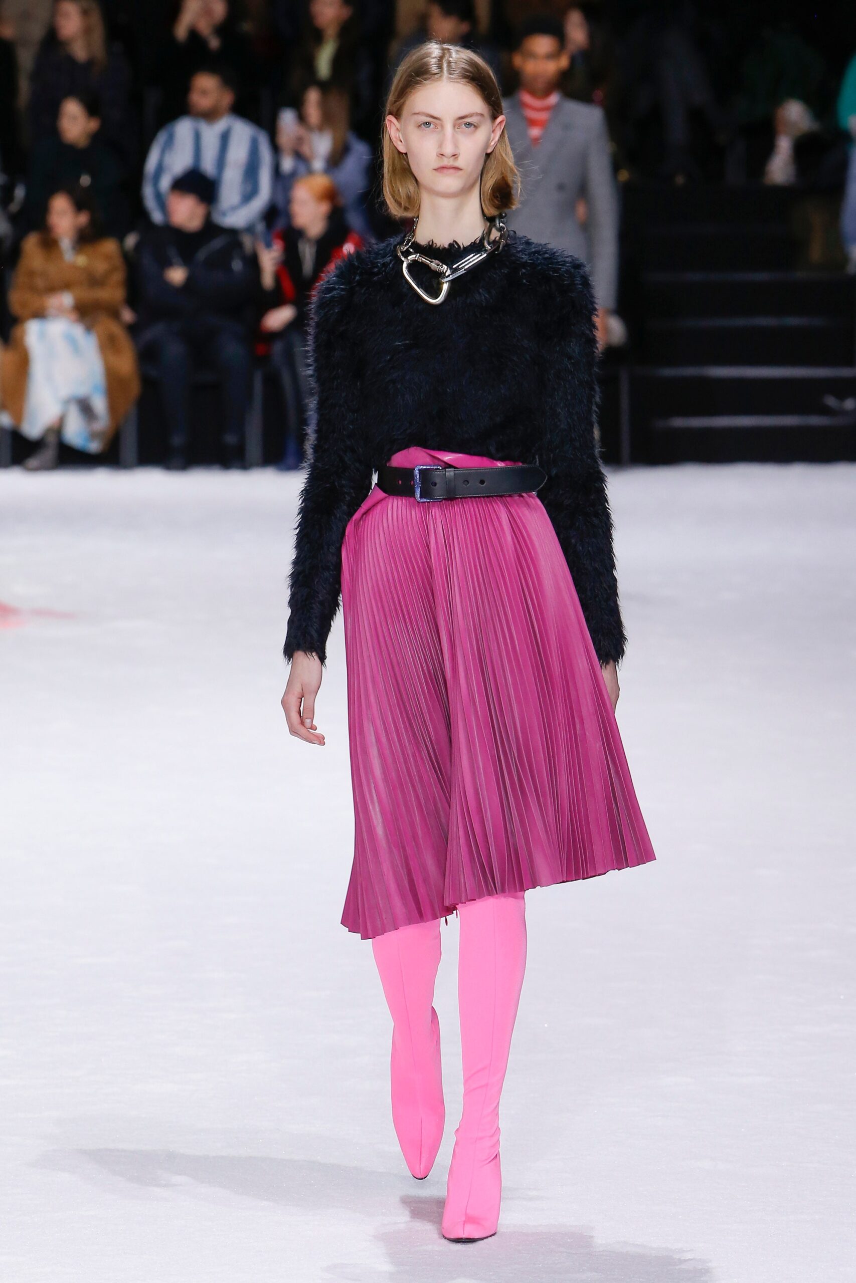 black fur sweater pink pleated skirt