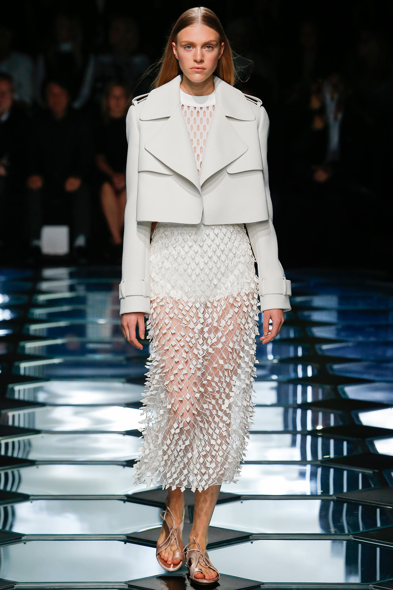 white leather coat and pleated dress