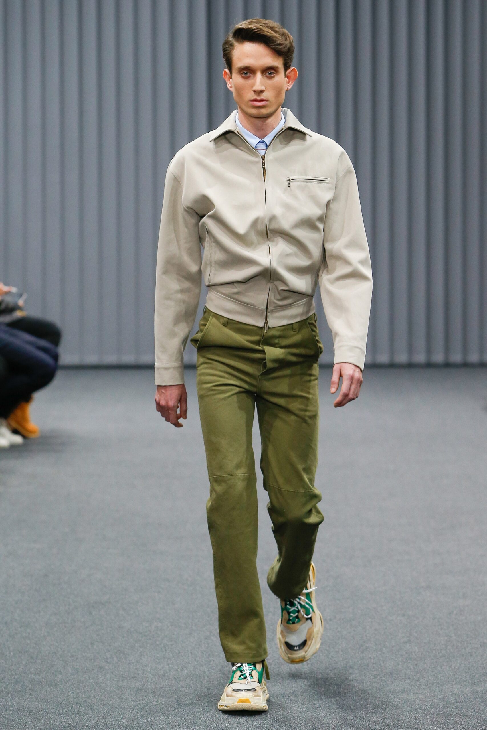 beige shirt green pants