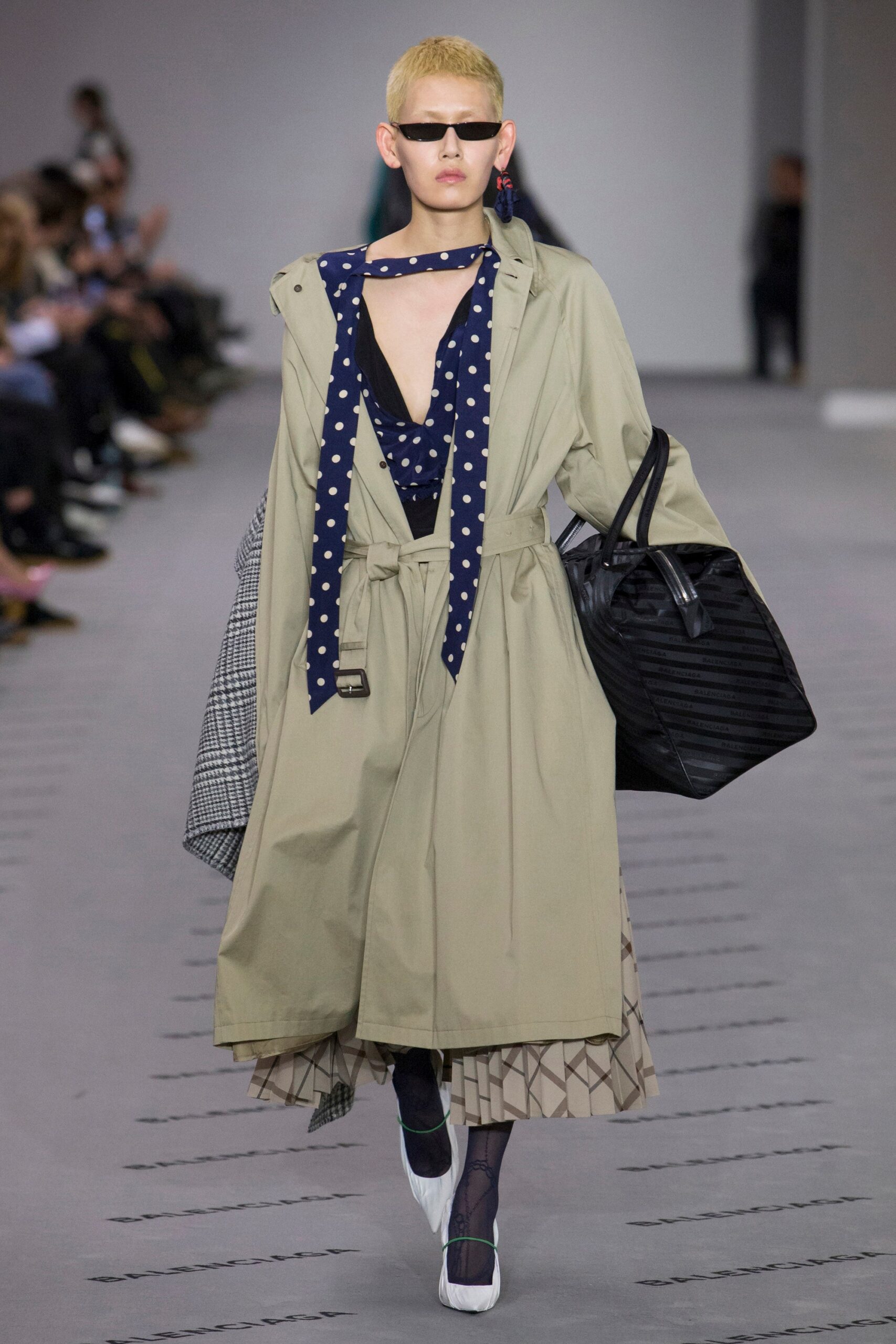 beige coat blue top pleated skirt