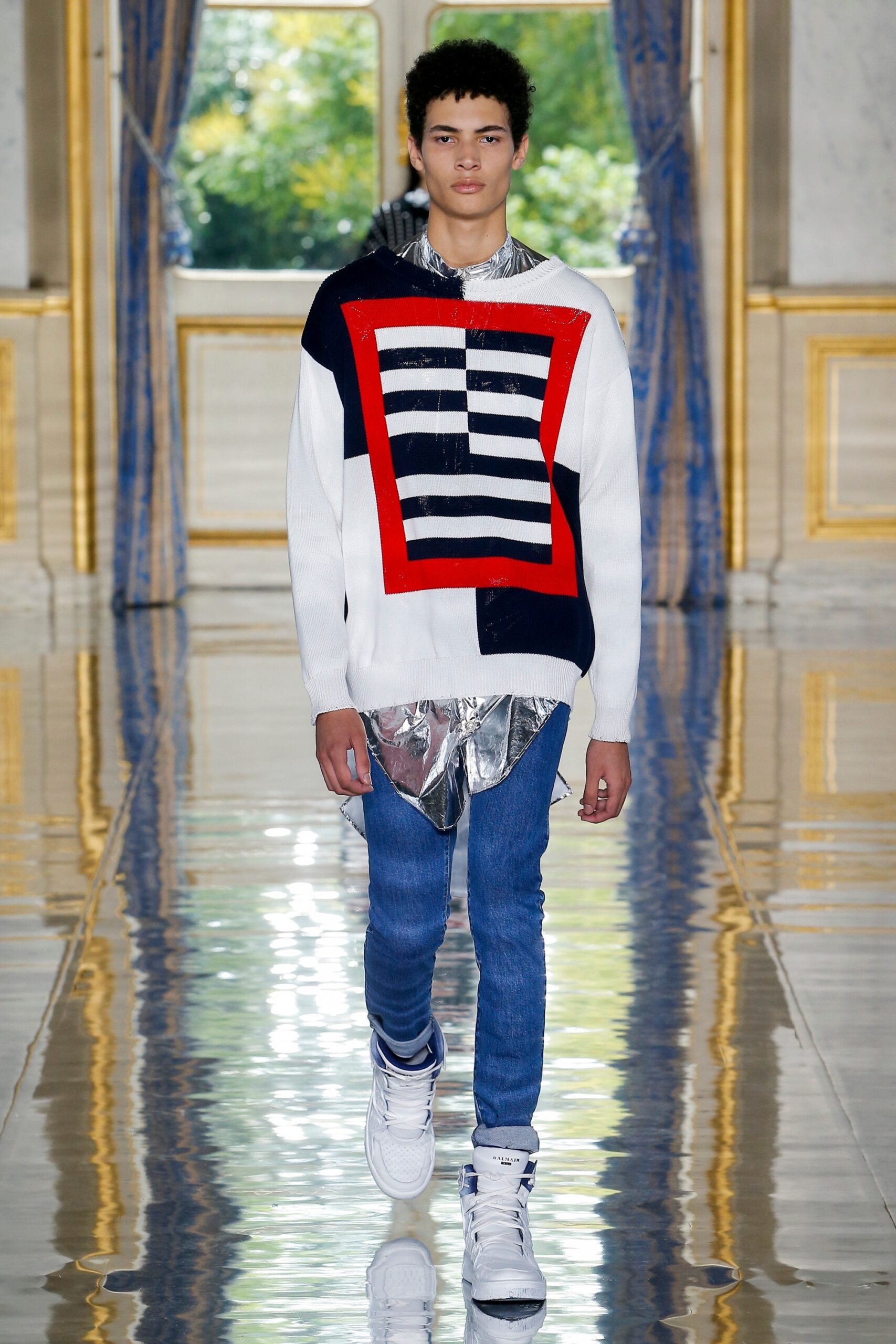 color-blocked sweater with jeans