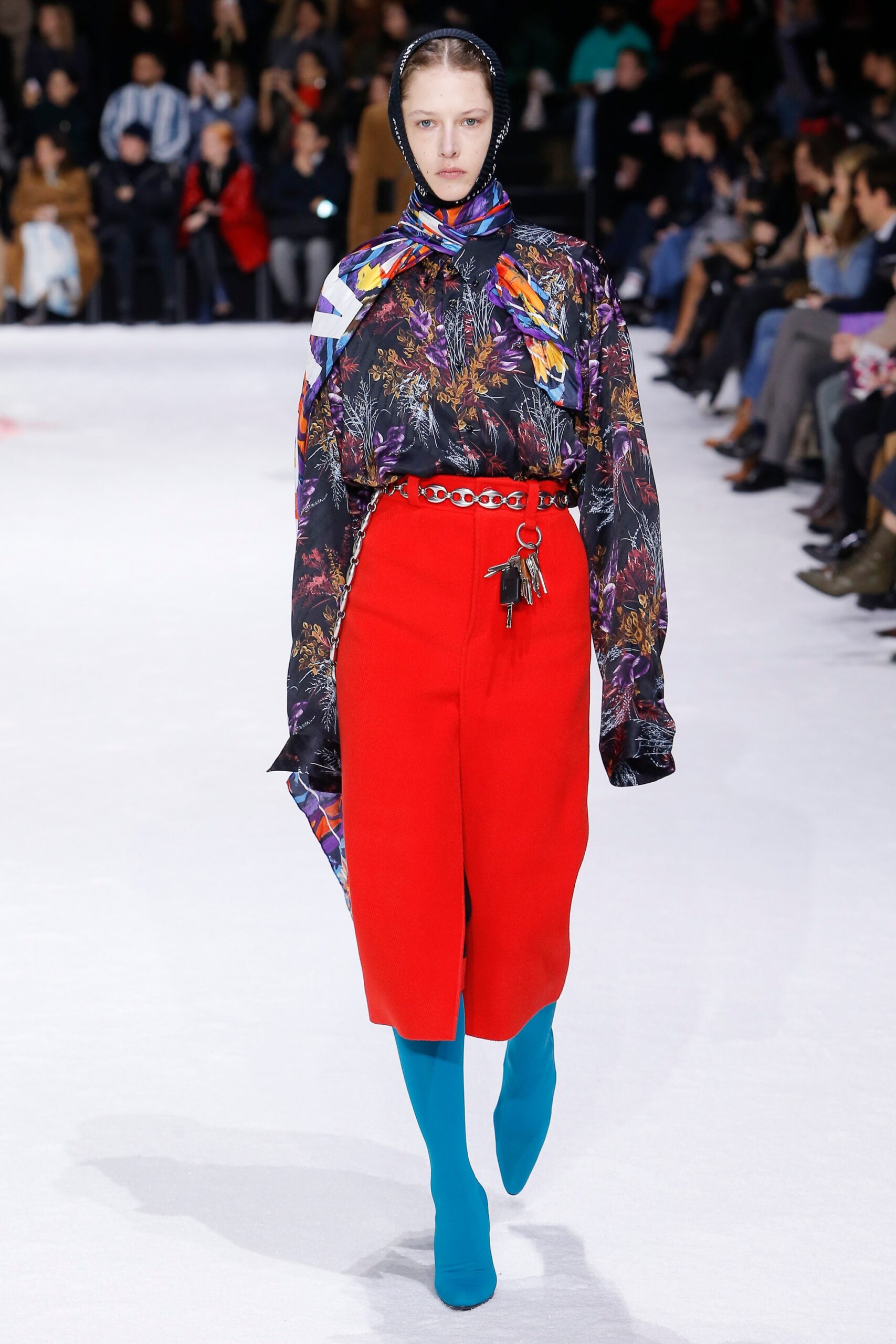 floral silk blouse with red shorts