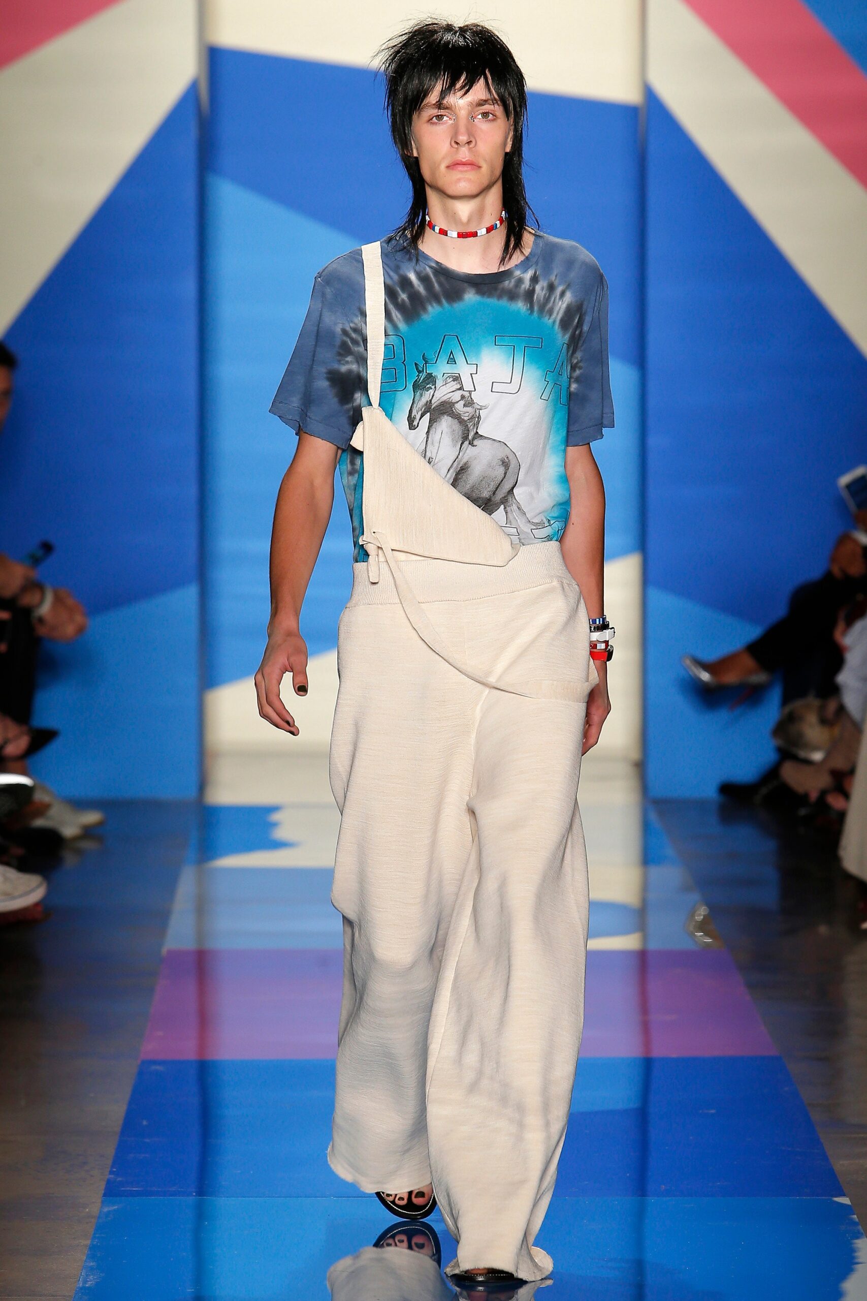 blue printed t-shirt and beige wide-leg pants